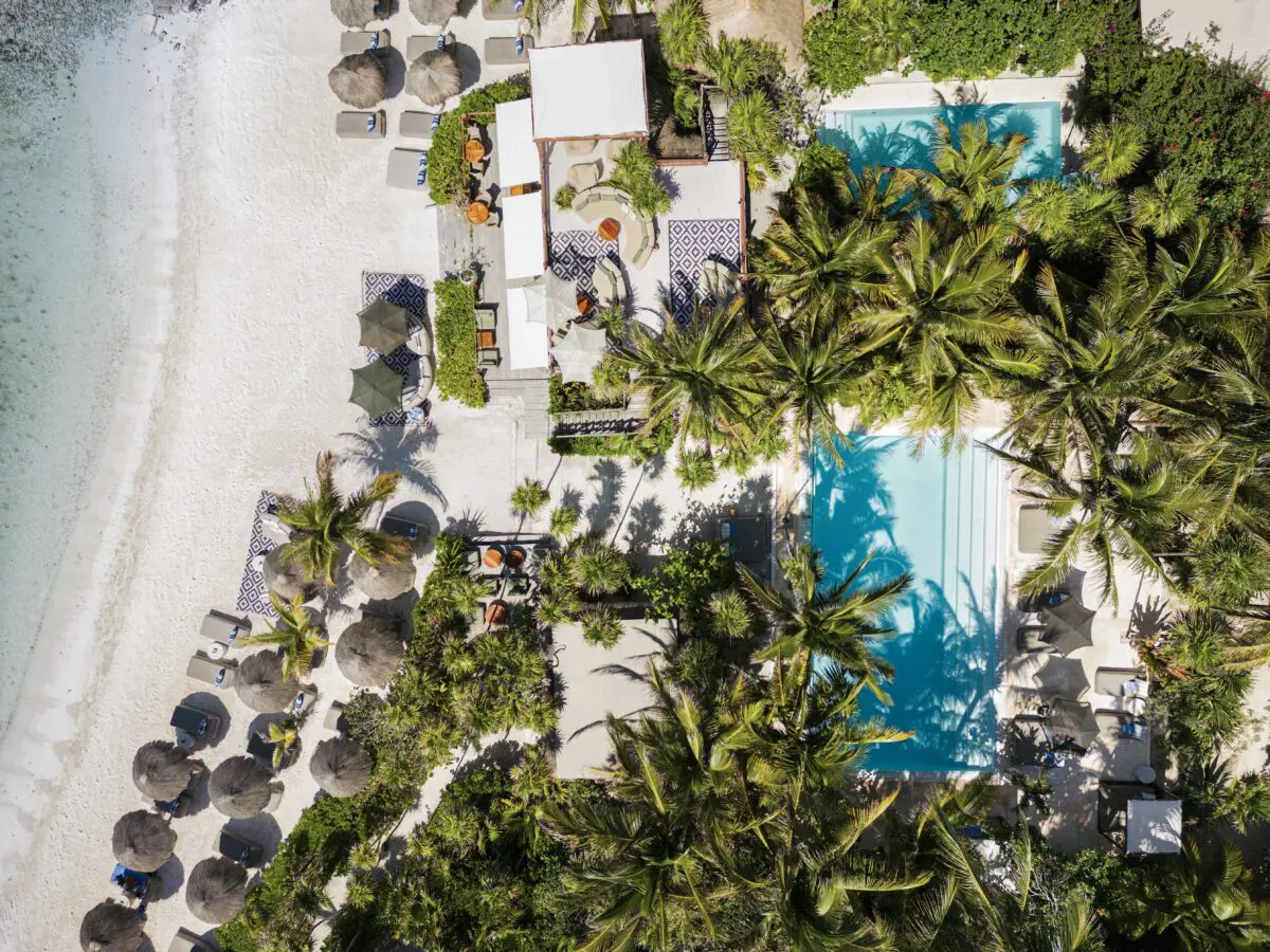 Aerial view of Jashita Hotel in Tulum, a beautiful wedding venue with pools and beach access.