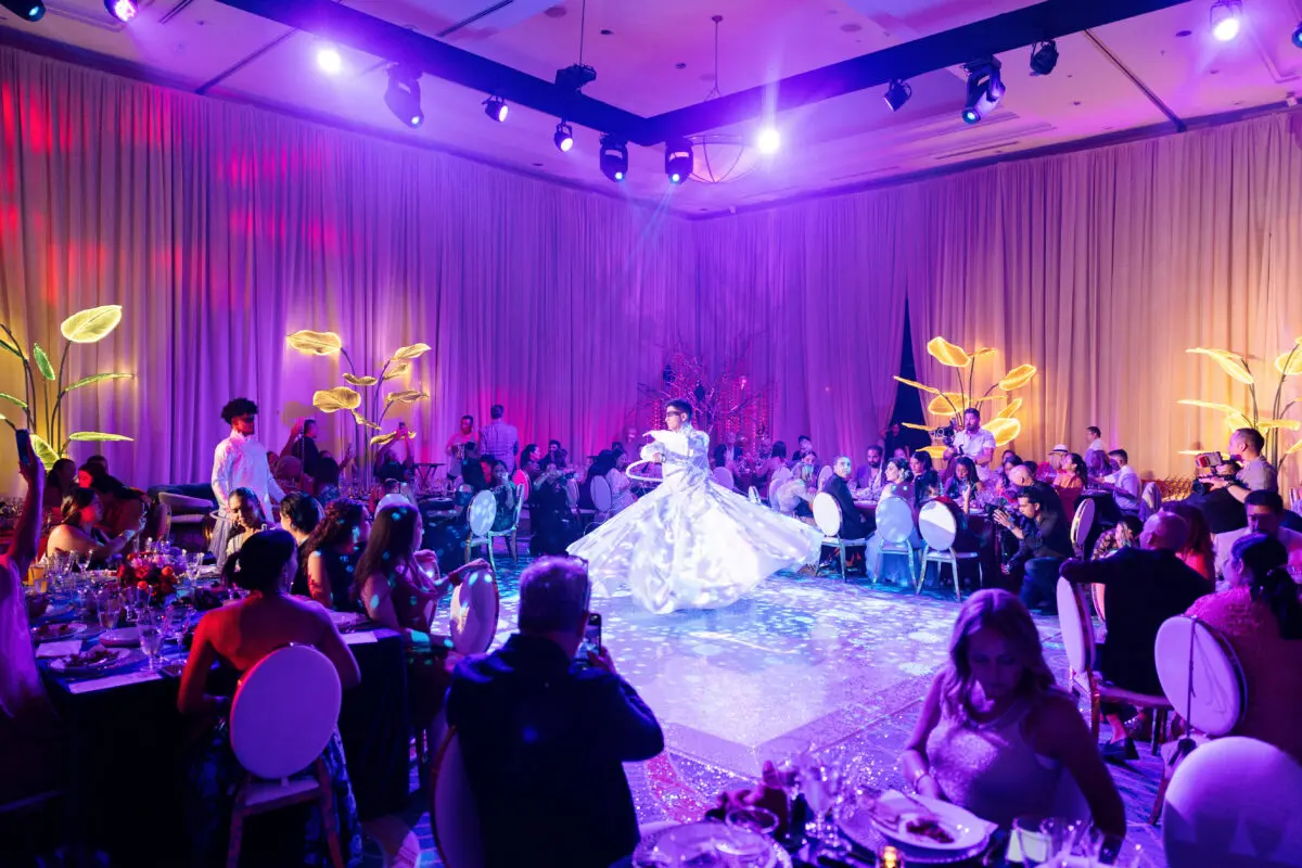 Dancer in flowing dress at Los Cabos destination wedding reception.