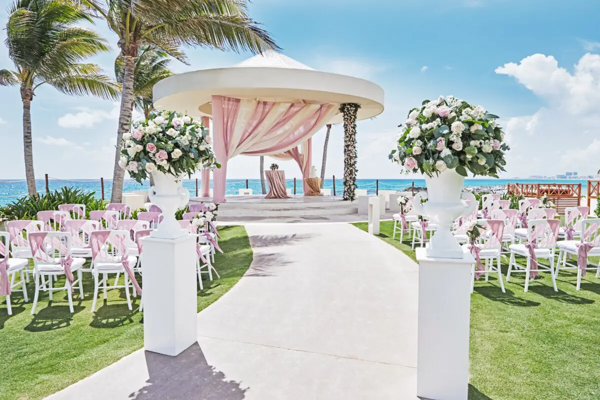 Cancun luxury wedding venue with ocean view and elegant gazebo.