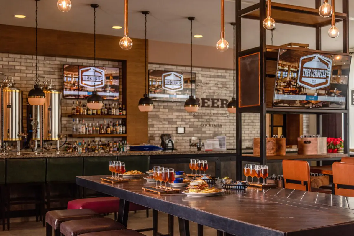 Upscale bar at Hyatt Ziva Cancún with drinks and food.