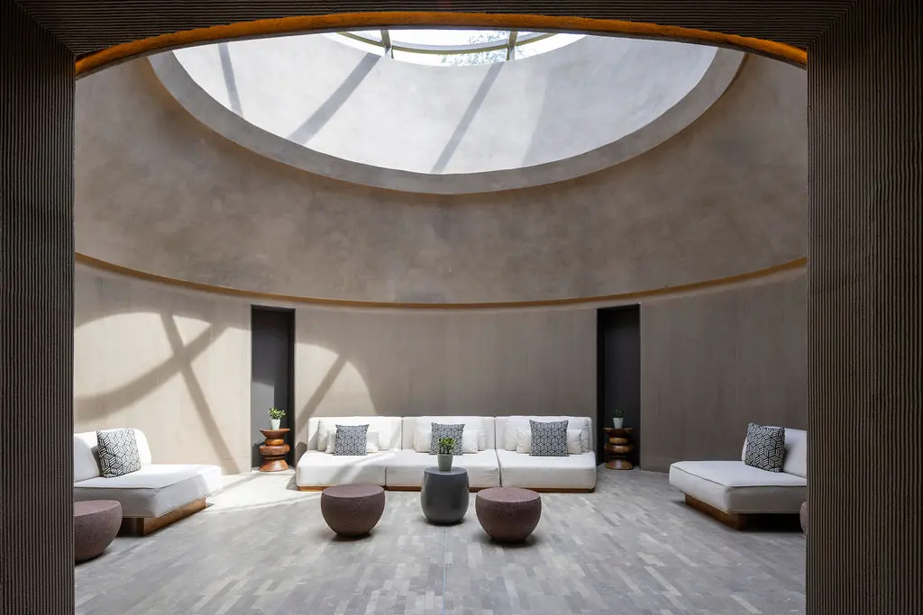 Waldorf Astoria Costa Rica: Elegant lounge area with round skylight, neutral tones, and modern seating.