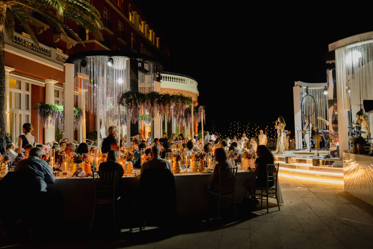 Luxury wedding in Saint-Tropez at COMO Le Beauvallon, outdoor reception at night.