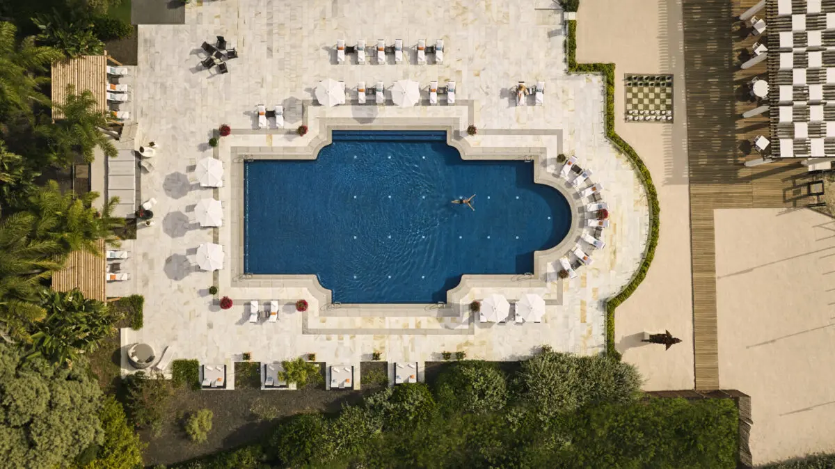 Aerial view of luxury pool at COMO Le Beauvallon, ideal for weddings in Saint-Tropez
