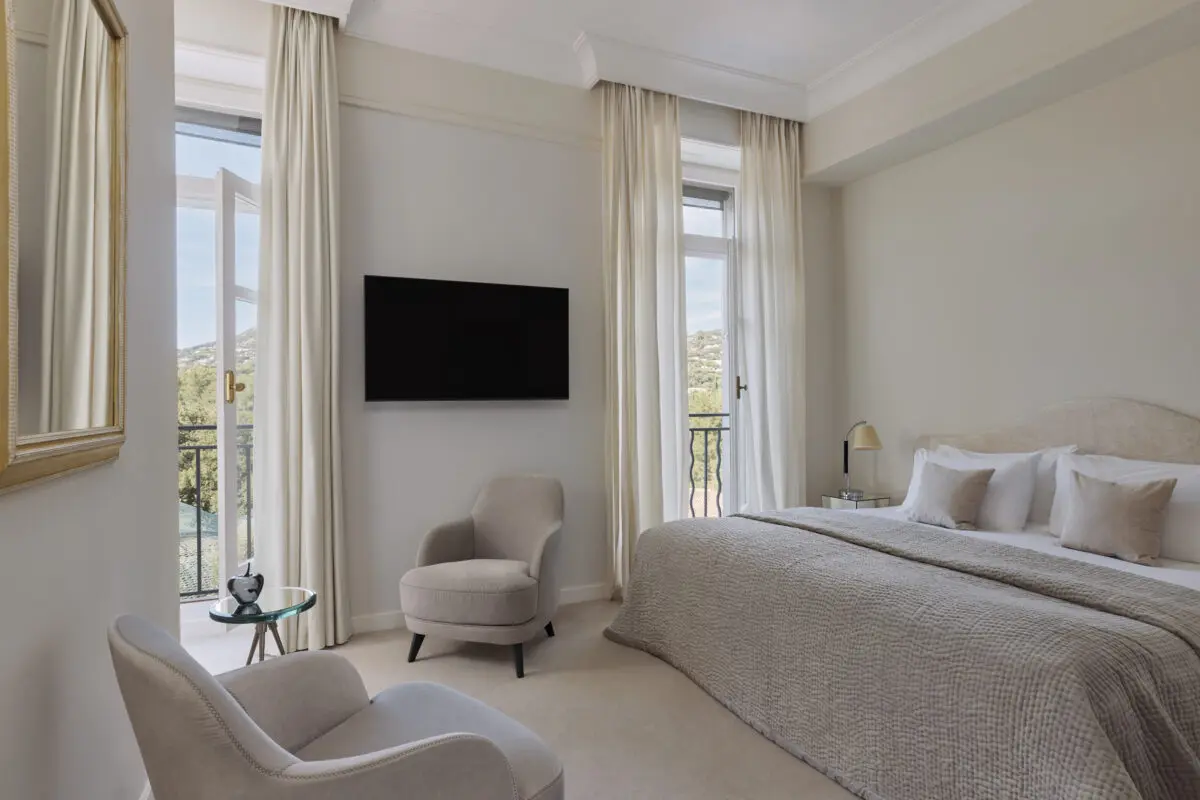 Elegant hotel room with balcony view at COMO Le Beauvallon, Saint-Tropez
