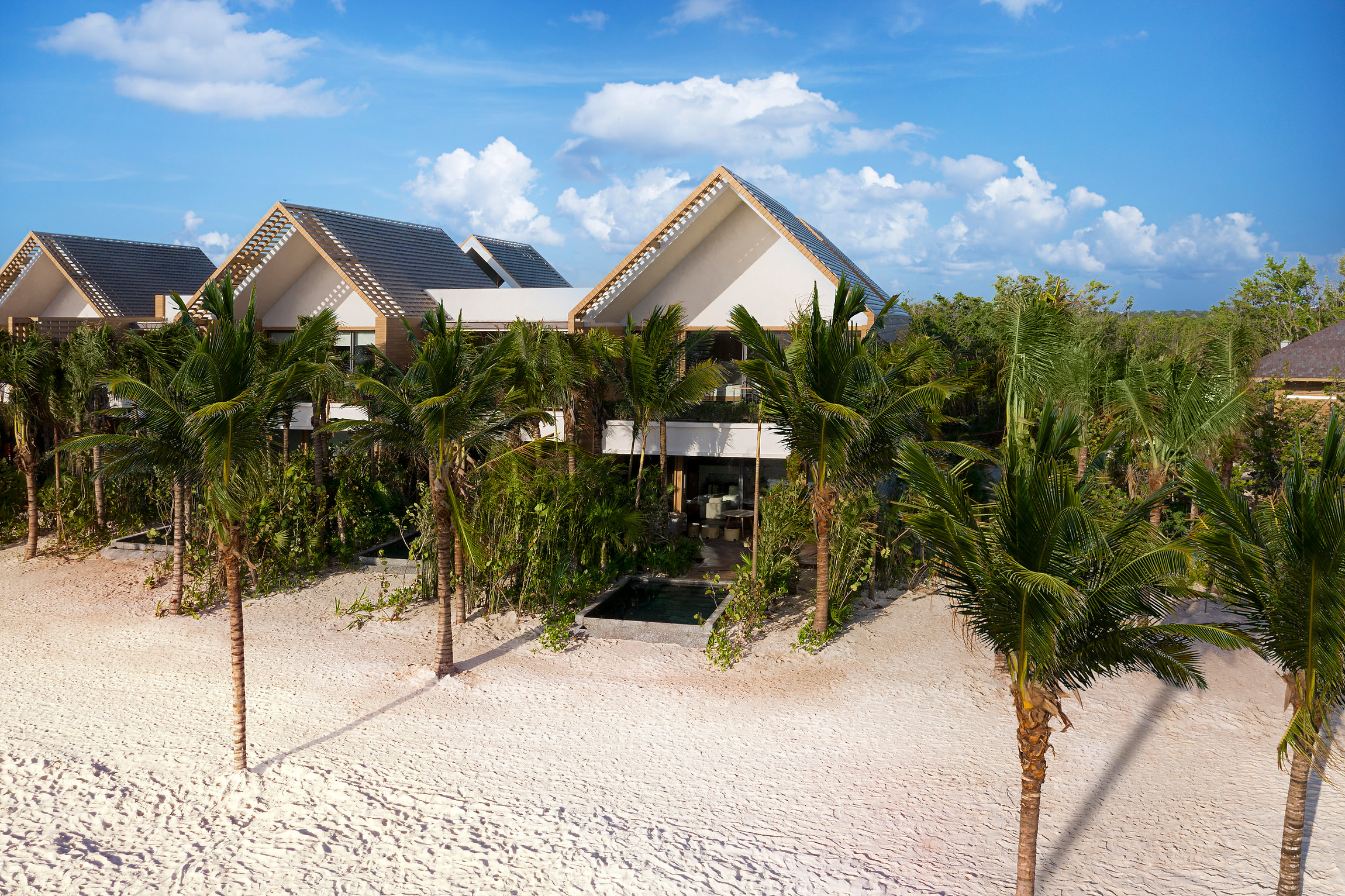Luxury villas at Banyan Tree Mayakoba resort on a white sand beach, Riviera Maya Ceremonies location.