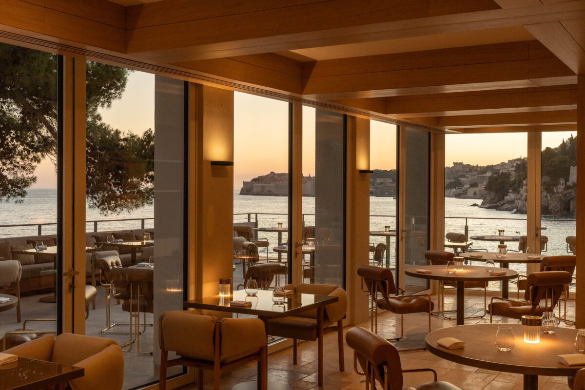 Elegant Villa Dubrovnik restaurant overlooking the Adriatic Sea at sunset, a Croatia destination wedding hotel.
