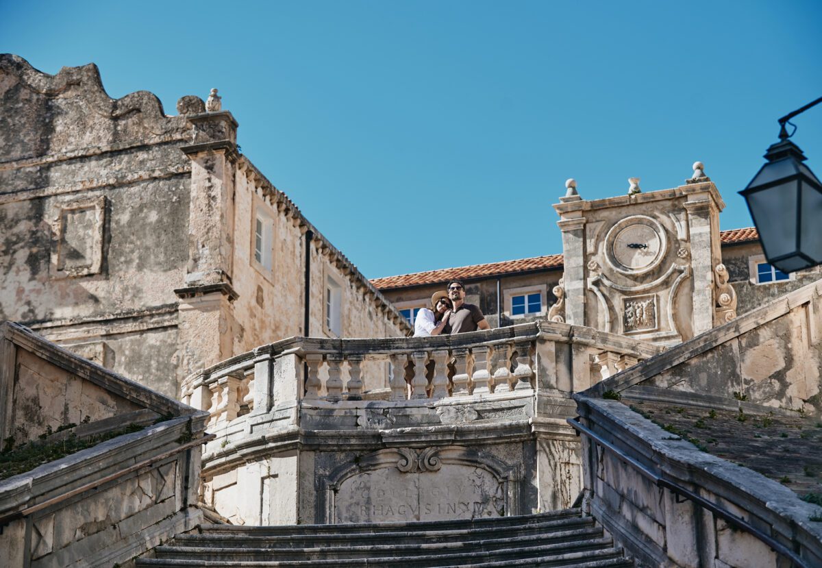 Couple at Dubrovnik's historic architecture, perfect for a Croatia Destination Wedding.