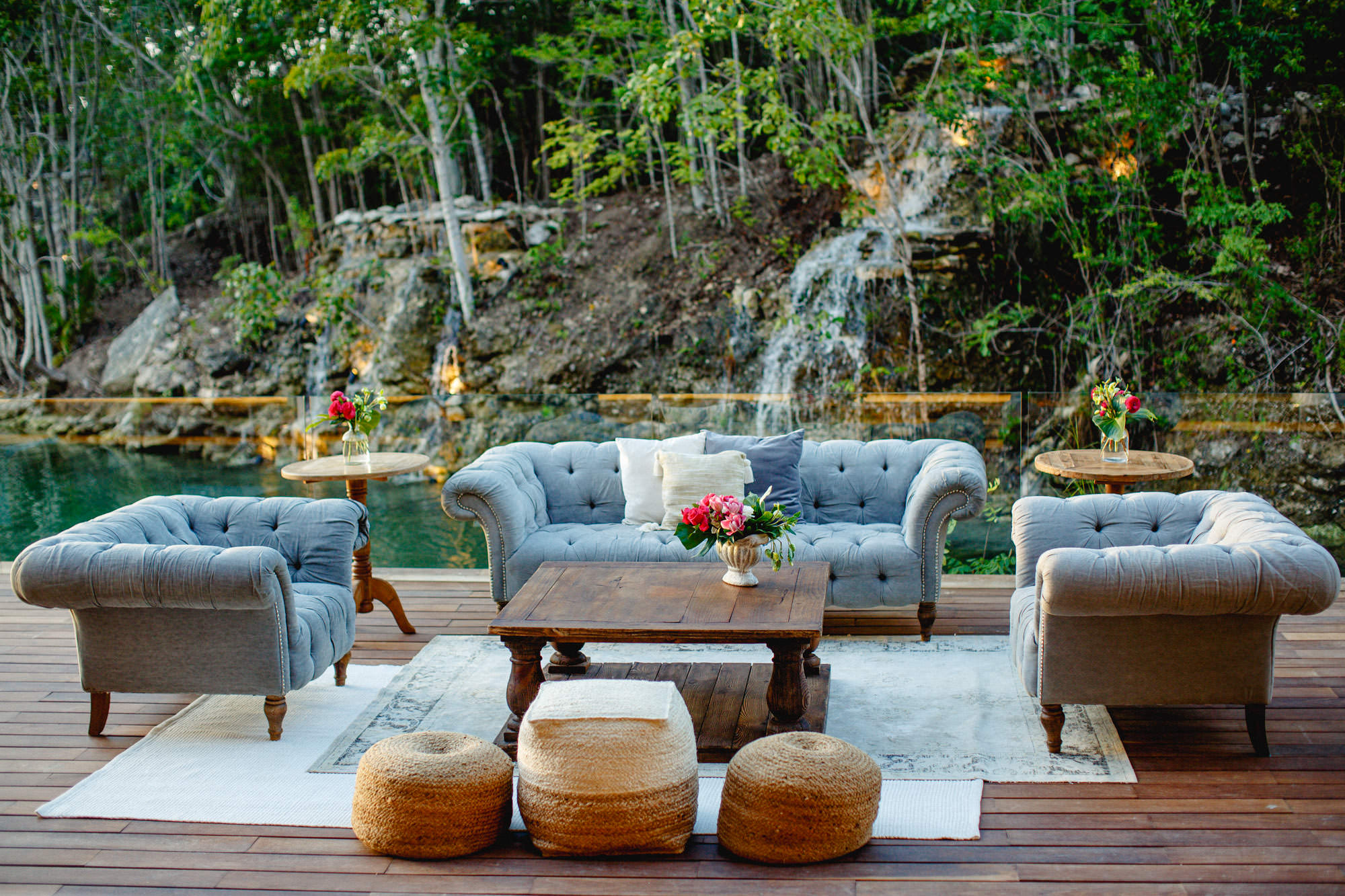 Riviera Maya Ceremonies setup at Banyan Tree Mayakoba with seating and waterfall.