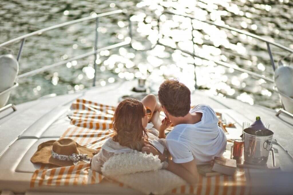 Couple on a boat on their honeymoon
