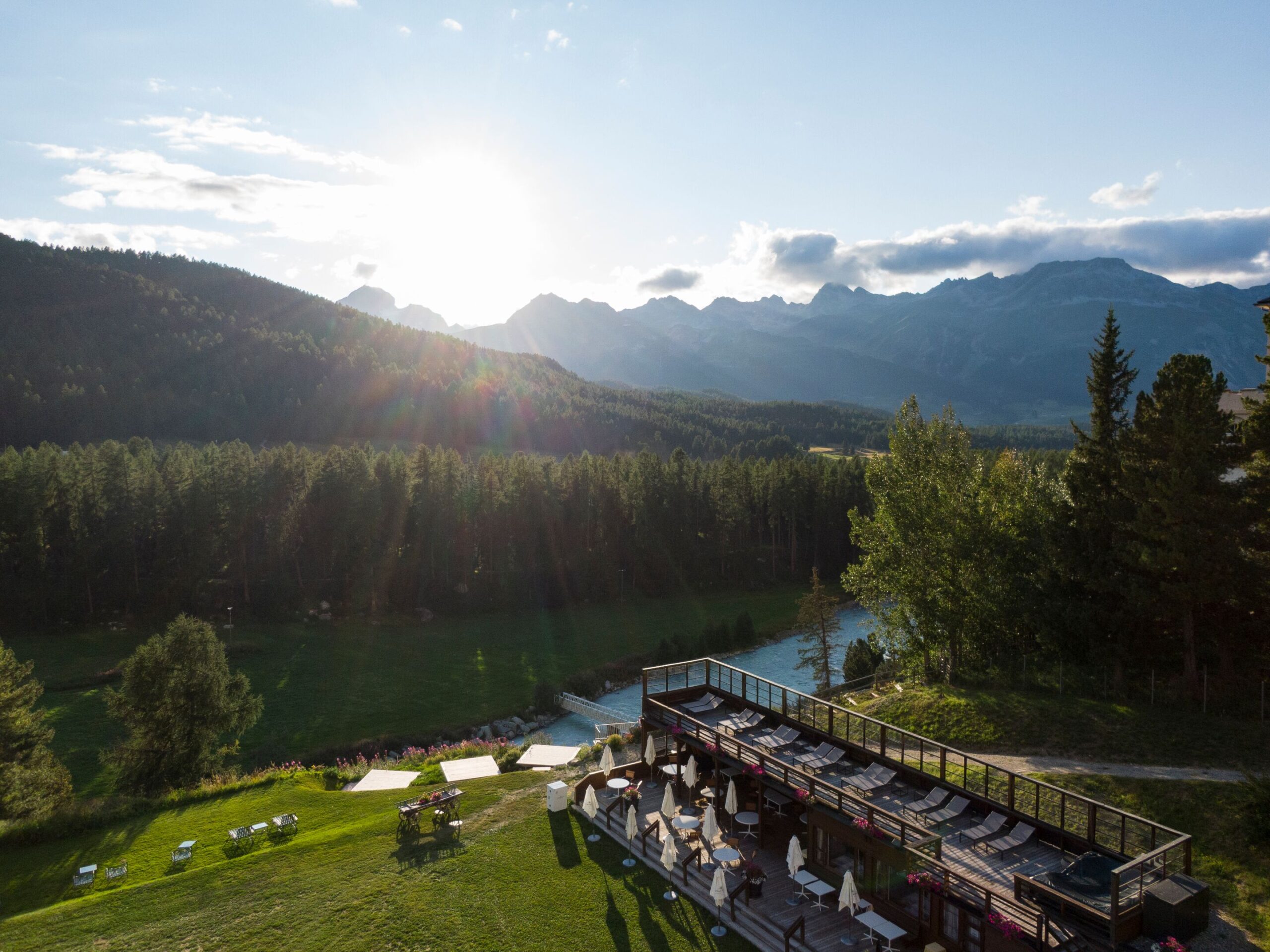 Grand Hotel Kronenhof terrace overlooking river and Swiss Alps, ideal for a wedding.