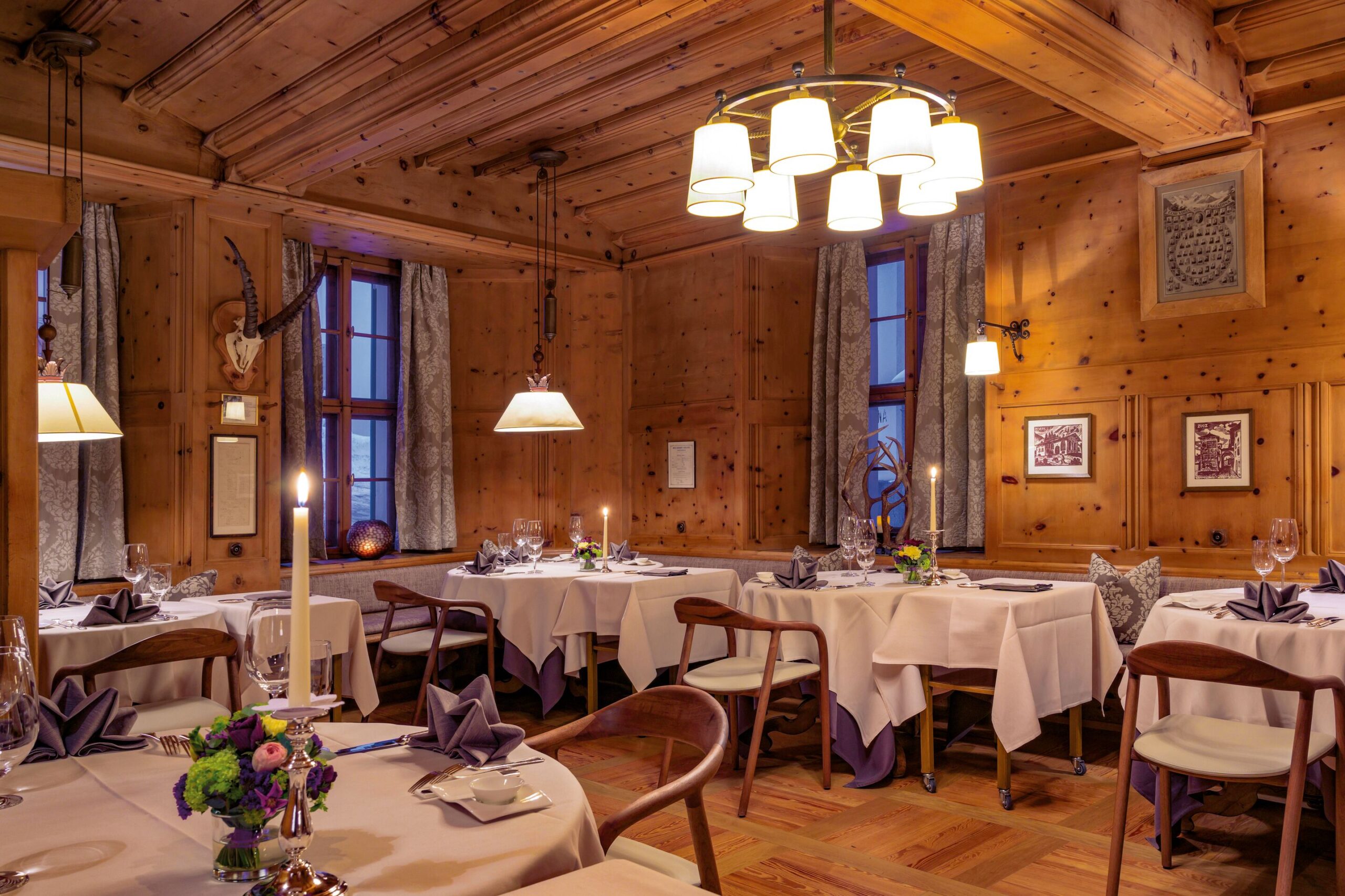 Elegant dining room at Grand Hotel Kronenhof, perfect for a Swiss Alps wedding celebration.