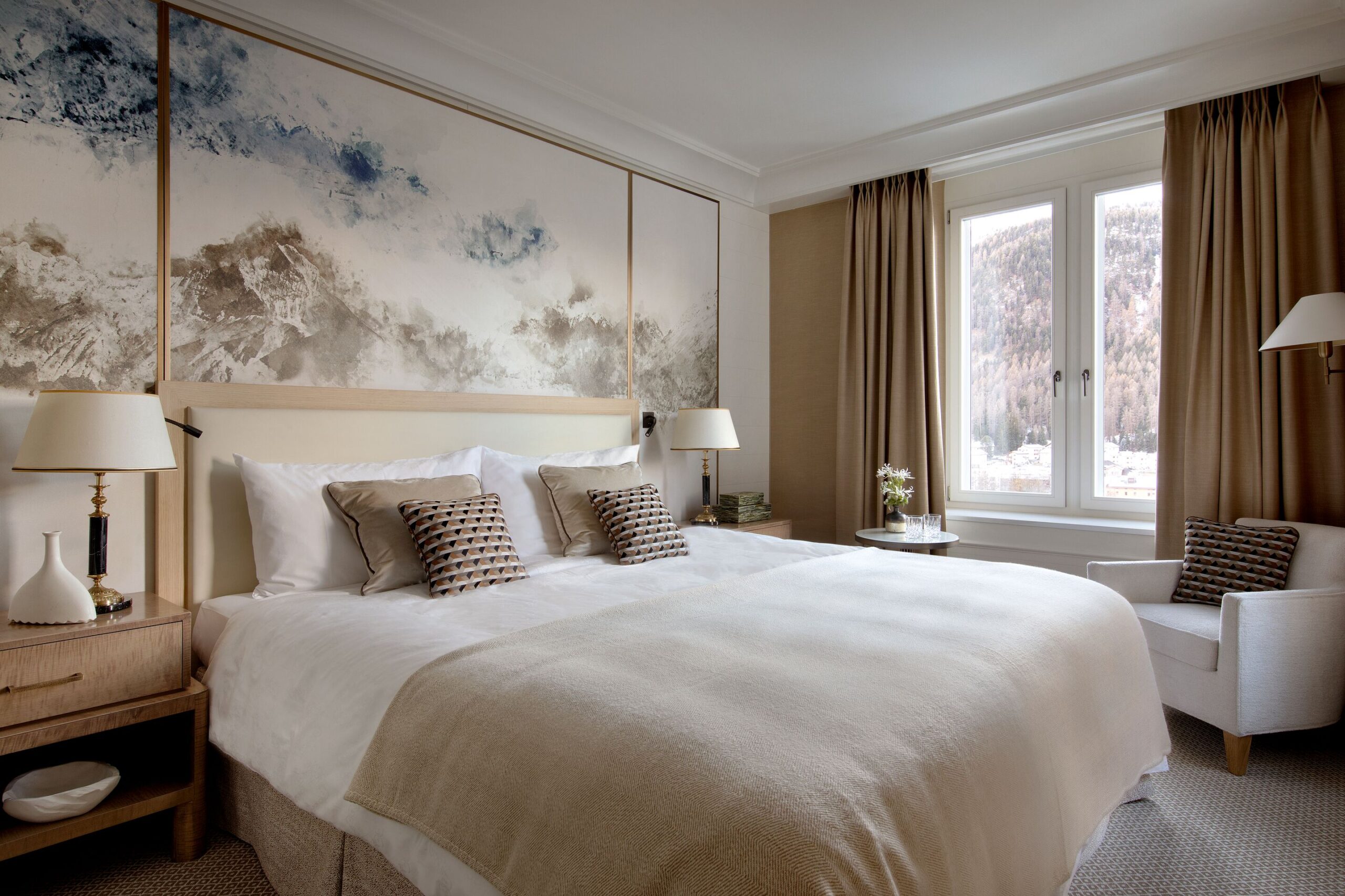 Grand Hotel Kronenhof bedroom with mountain view. A luxurious Swiss Alps wedding destination.