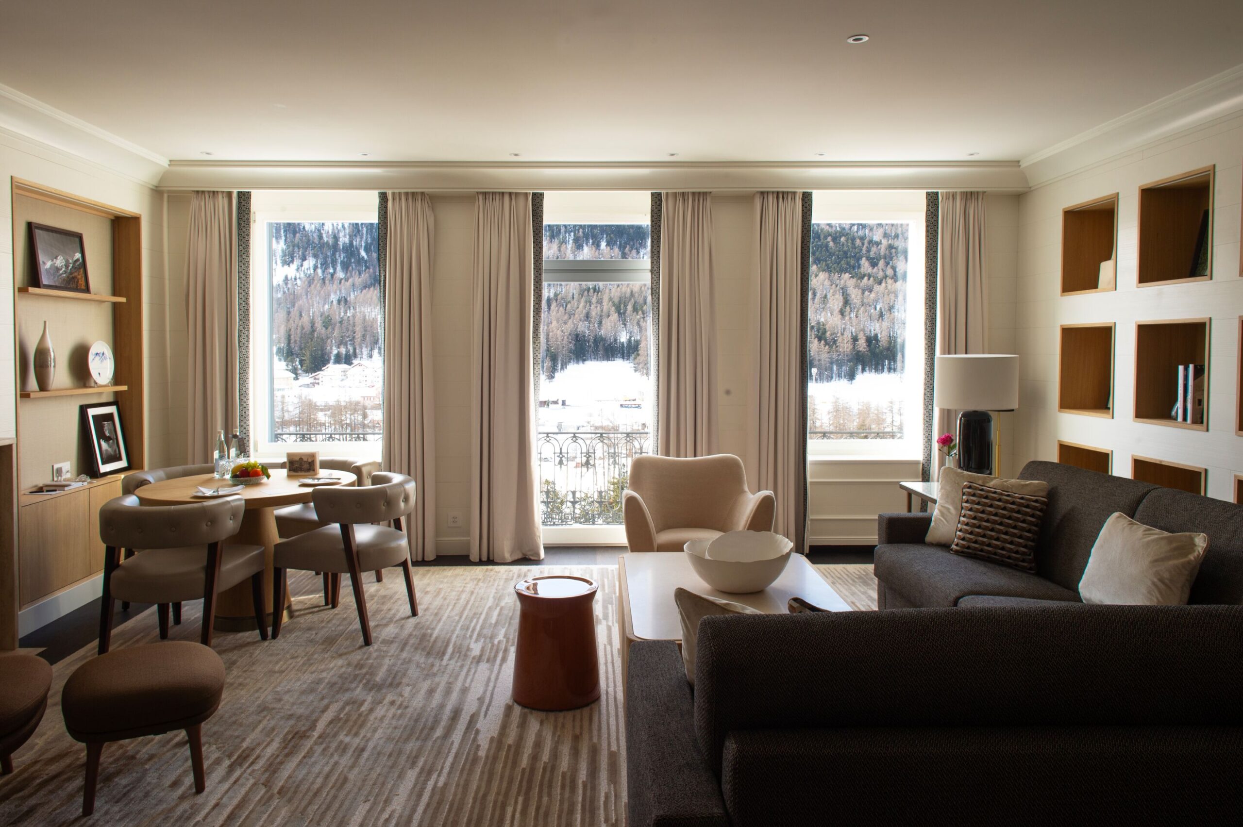 Living area in Grand Hotel Kronenhof with Swiss Alps view.