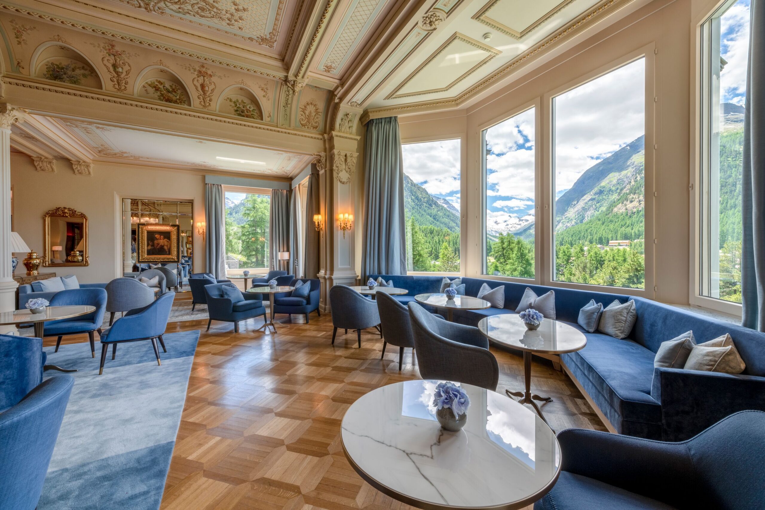 Elegant lounge at Grand Hotel Kronenhof with Swiss Alps view, ideal for a Swiss Alps wedding.