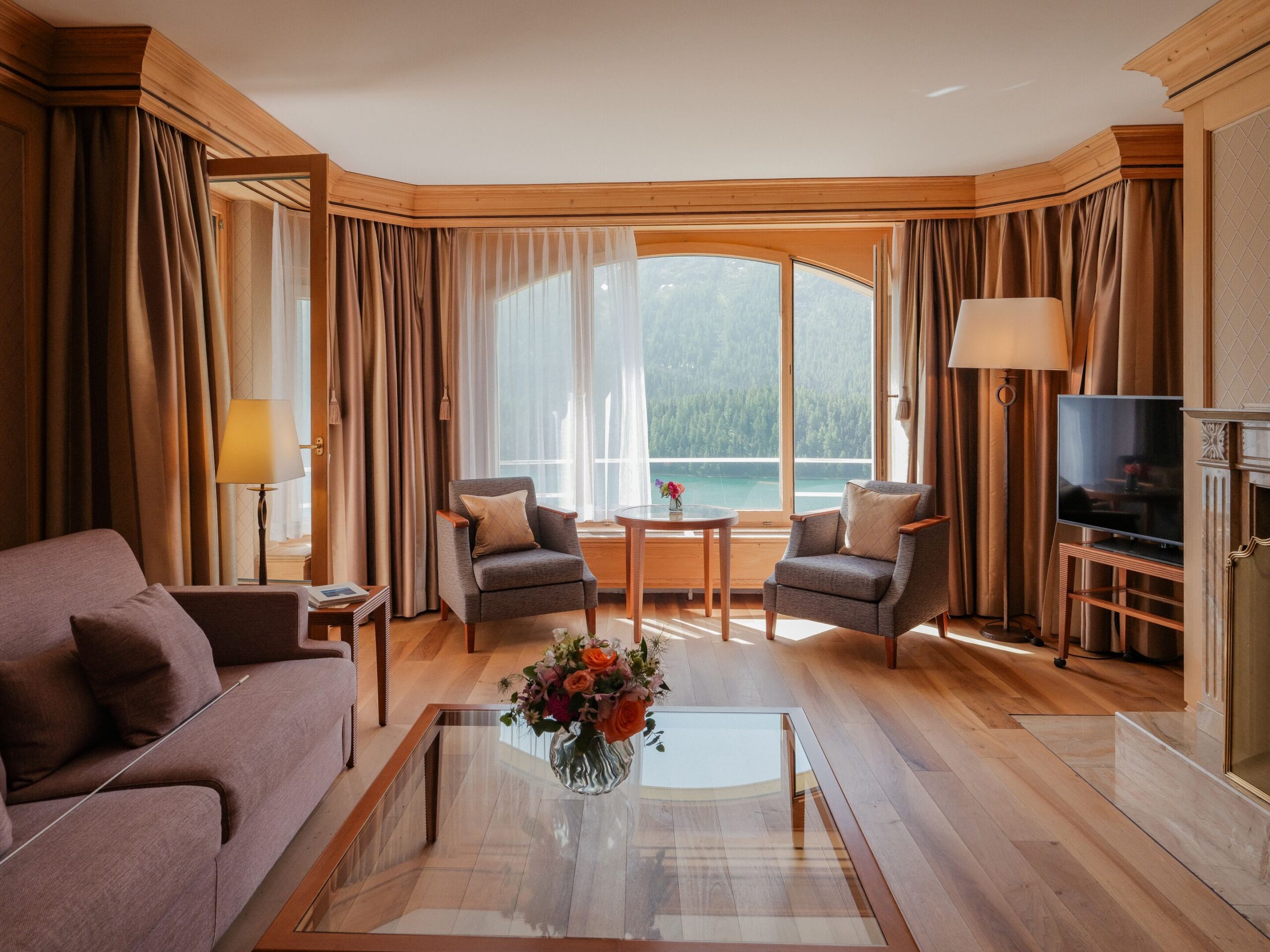 Luxurious suite at Kulm Hotel St. Moritz with lake view, perfect for a Switzerland wedding.