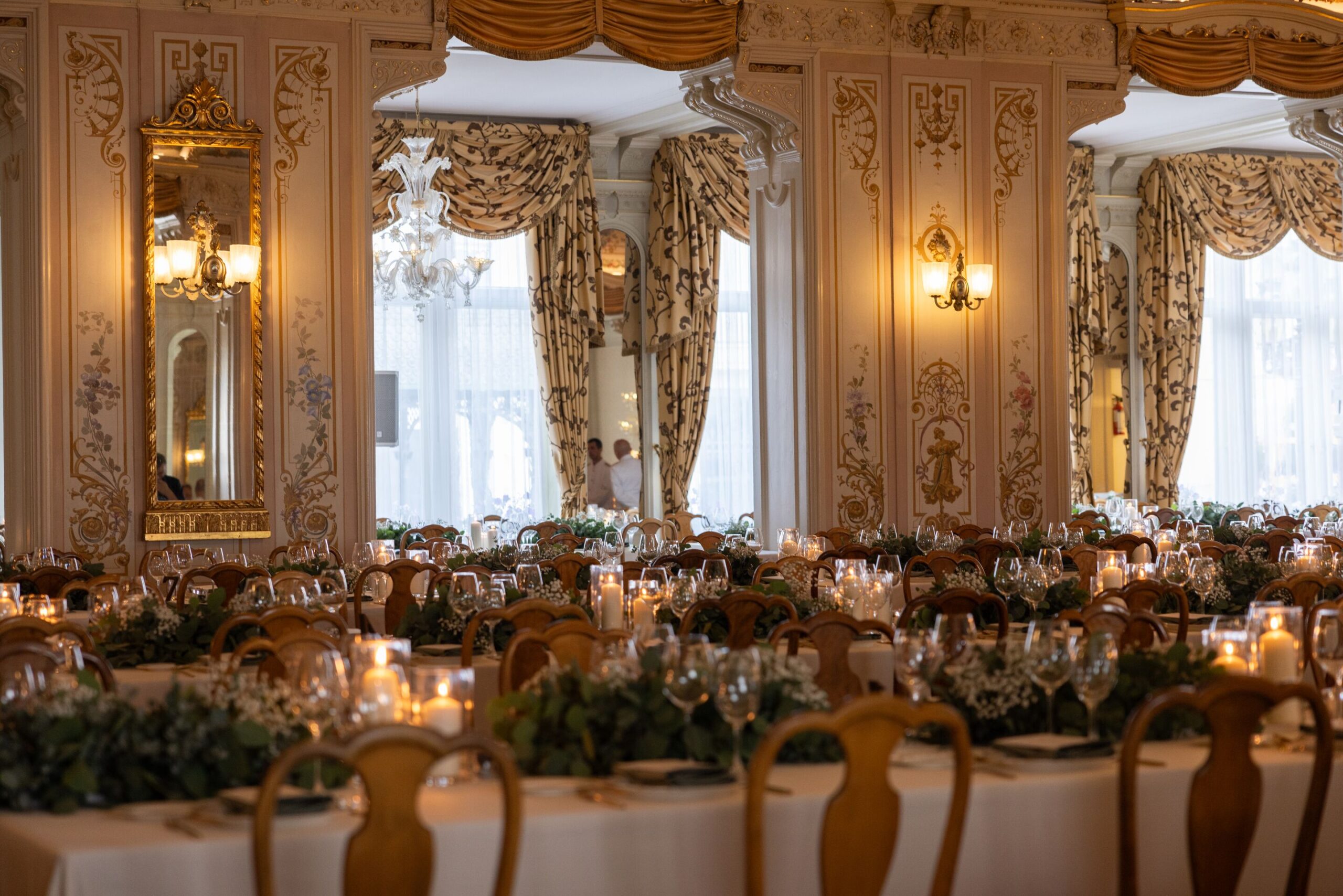 Swiss Alps wedding reception at the Grand Hotel Kronenhof with elegant table settings and decor.