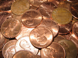 pennies indicating travel insurance cost