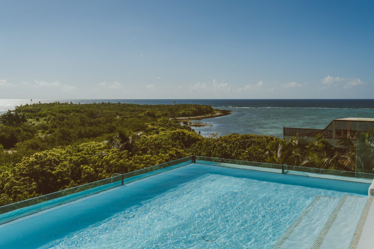 Luxury pool overlooking the Caribbean Sea at Jashita Hotel Tulum.