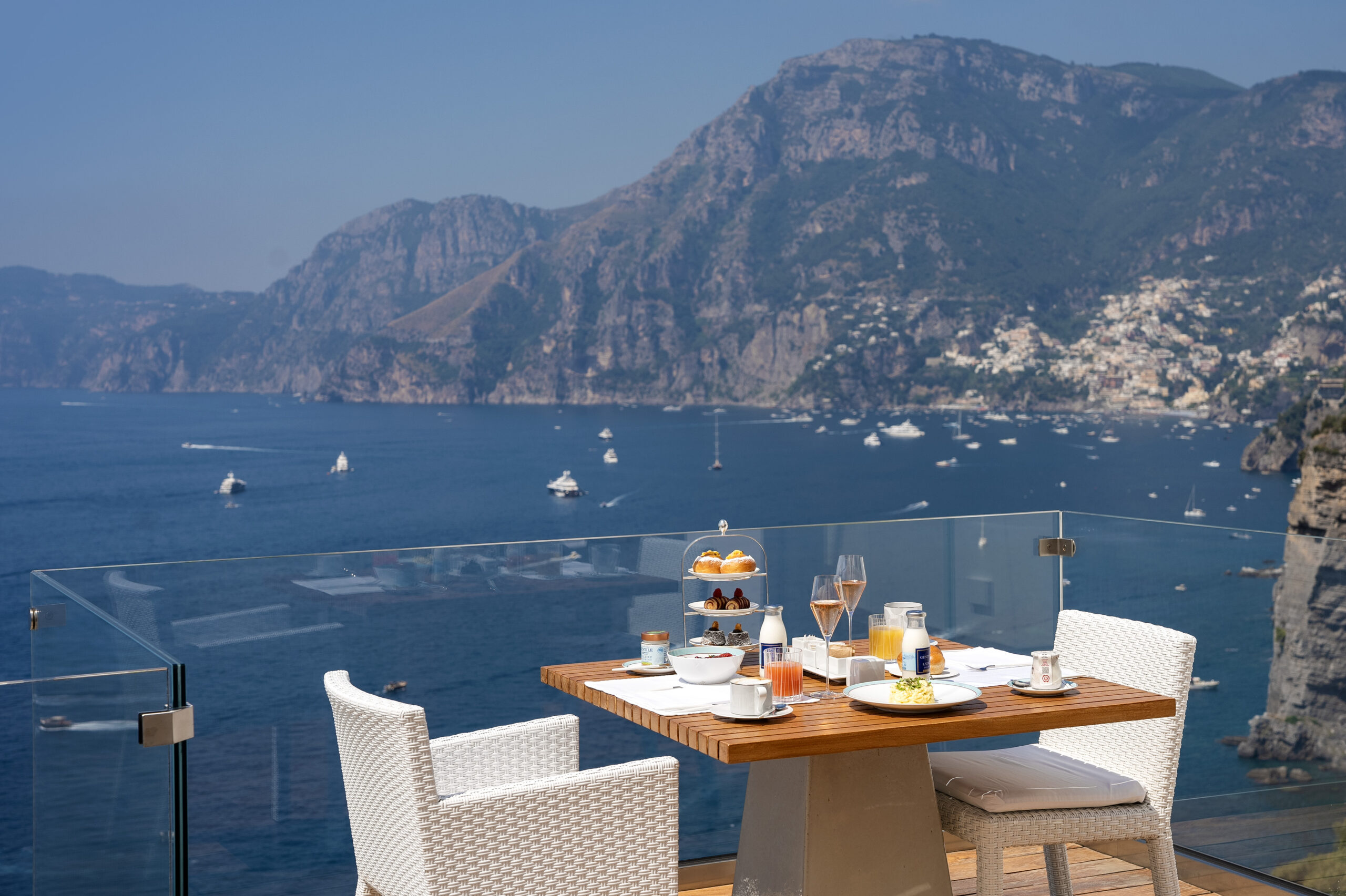 Breakfast with Amalfi Coast view at Casa Angelina. Wedding venue with ocean backdrop.