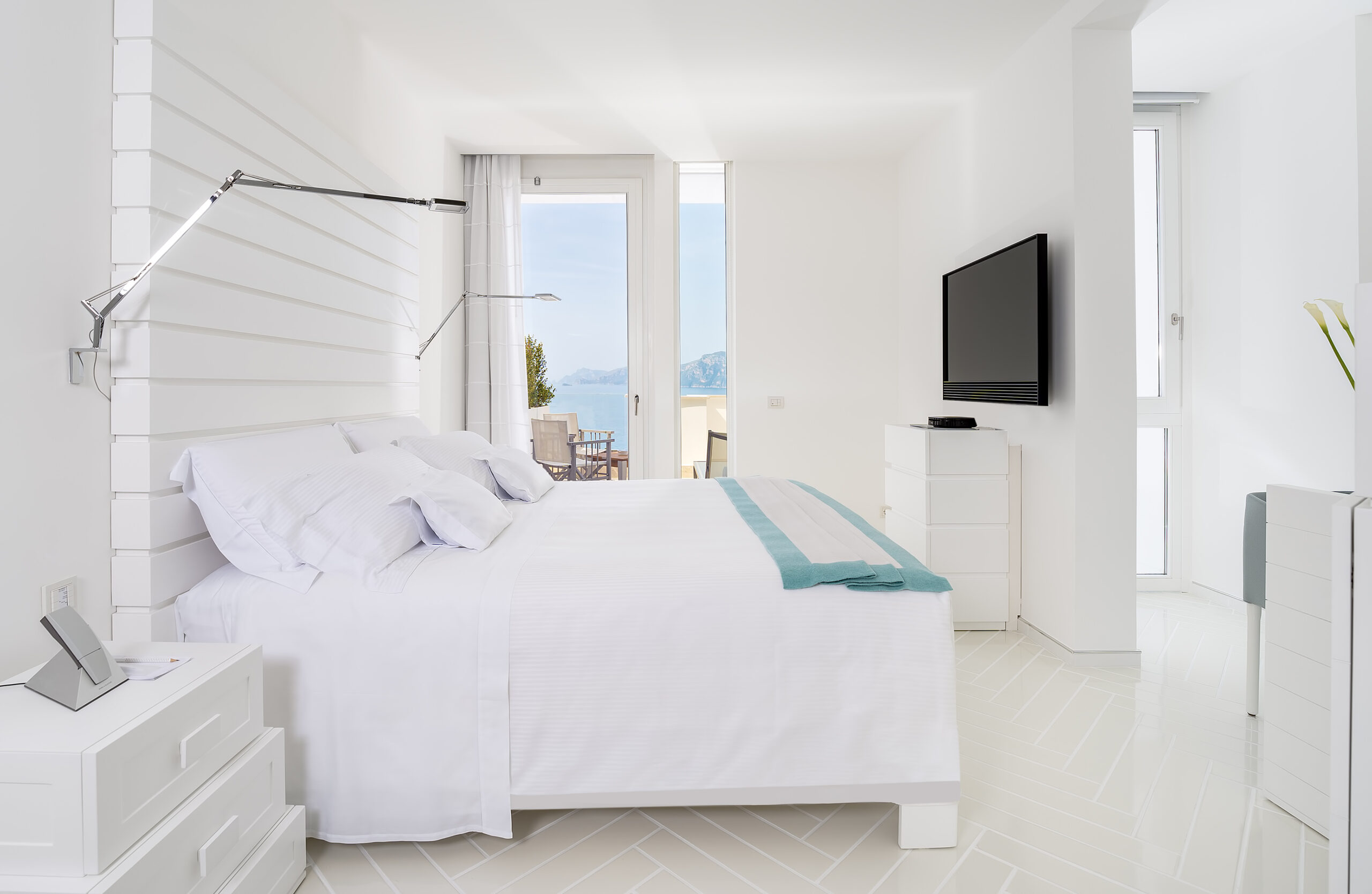 Casa Angelina bedroom with a sea view, perfect for an Amalfi Coast wedding stay.