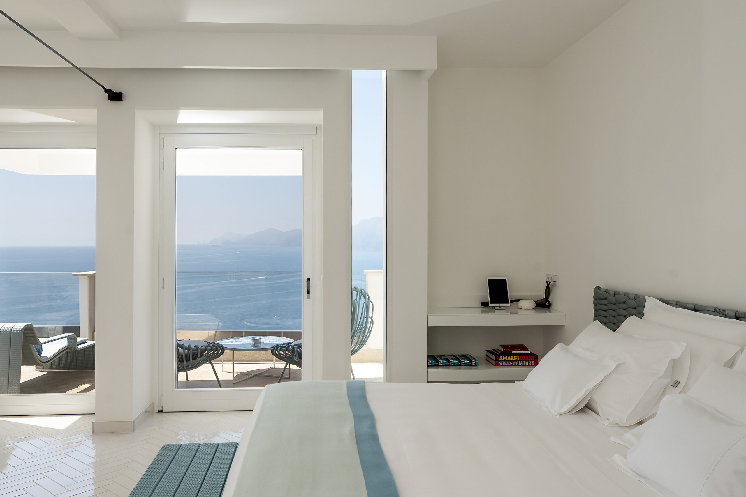 Casa Angelina bedroom with Amalfi Coast view from the balcony.