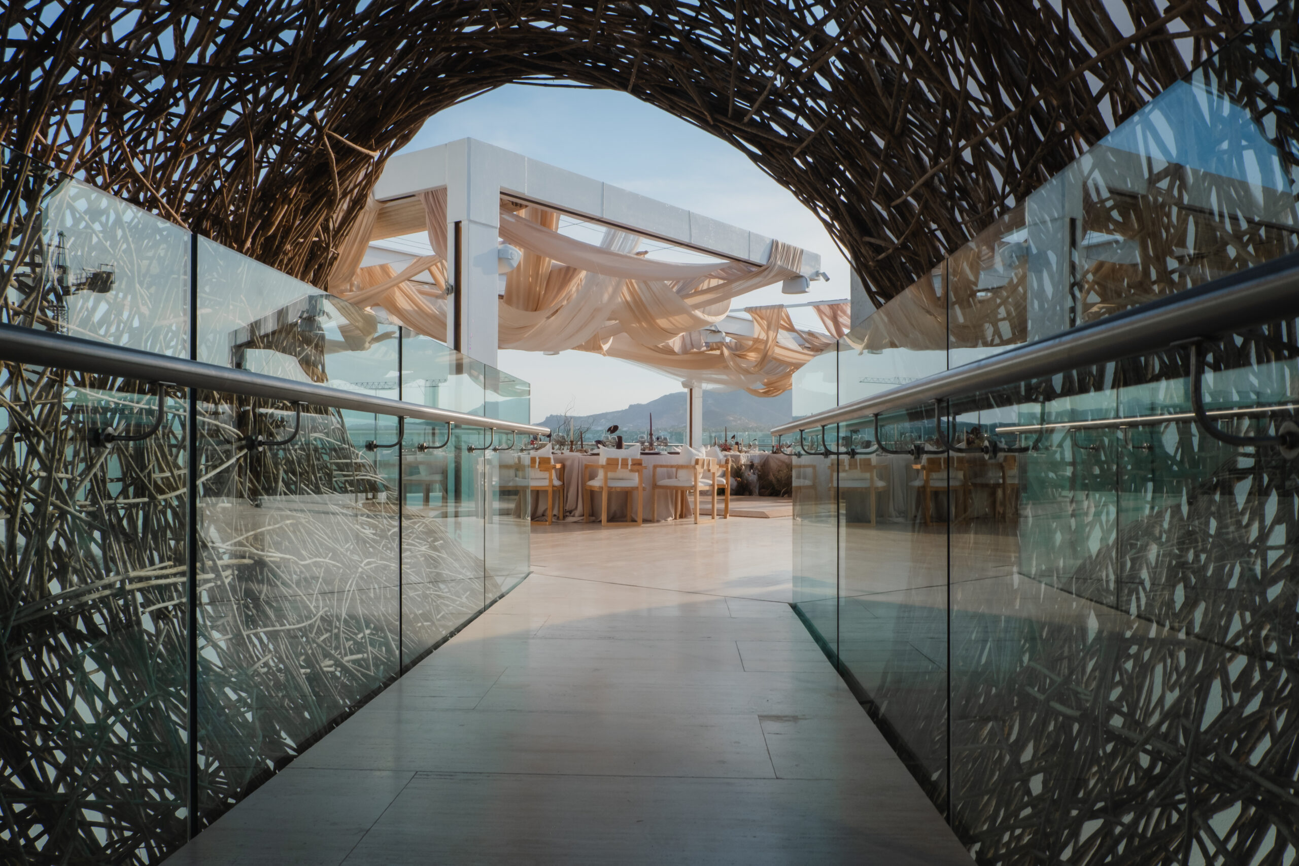Viceroy Los Cabos wedding venue with woven archway and ocean view. Ideal Mexico beach resort for destination weddings.