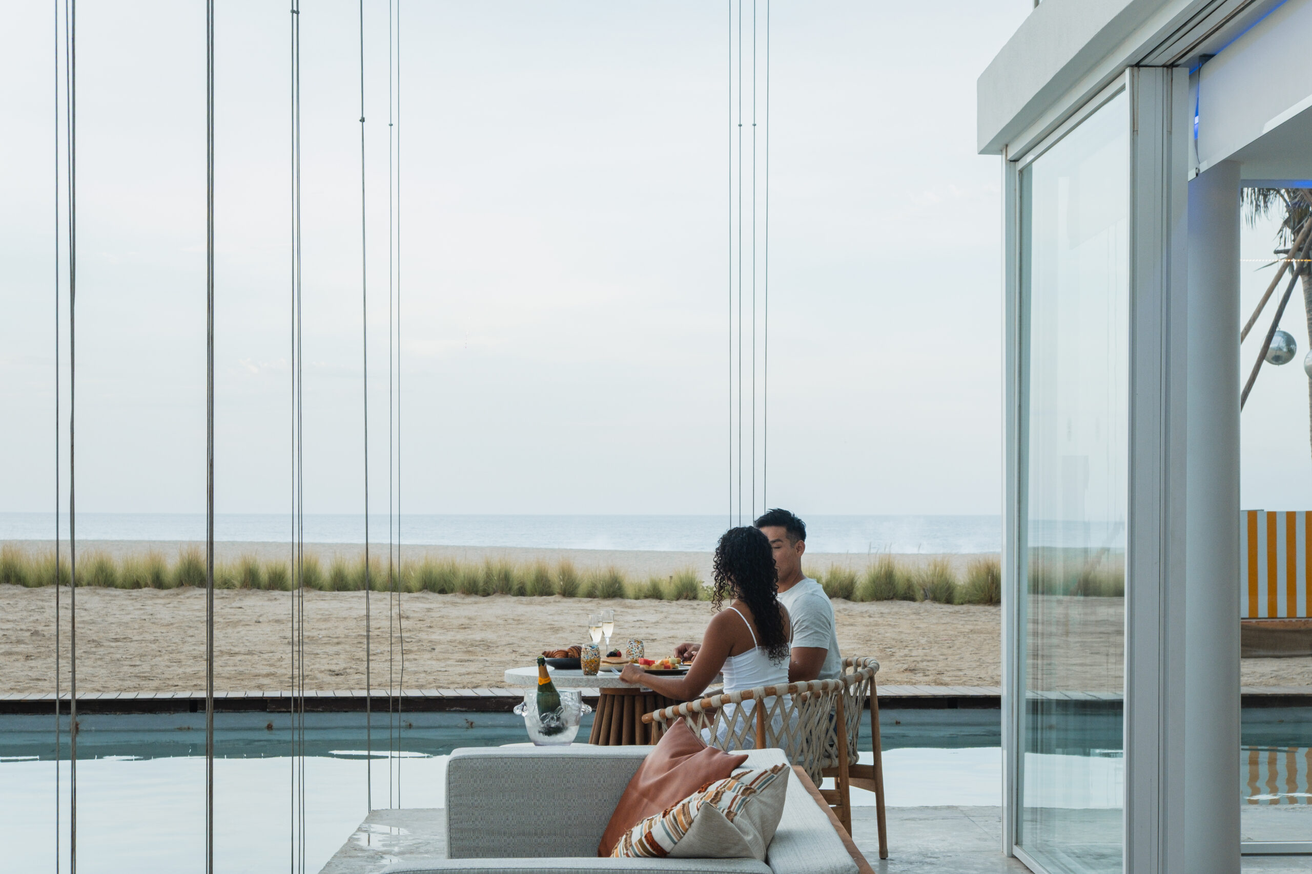 Couple dining at Viceroy Los Cabos, a Mexico beach resort with ocean view. Wedding potential.