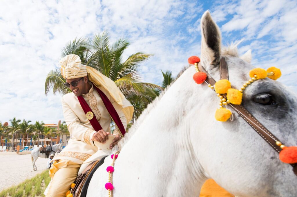 indian groom on horse