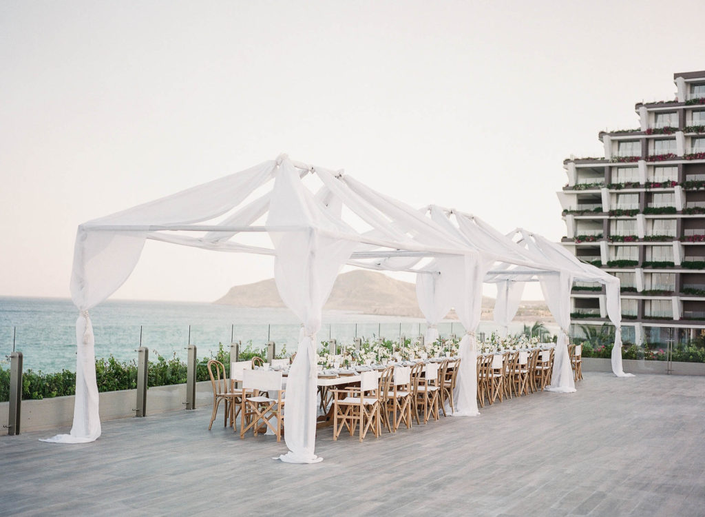 Outdoor wedding banquet at a beach resort