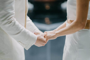 wedding couple holding hands