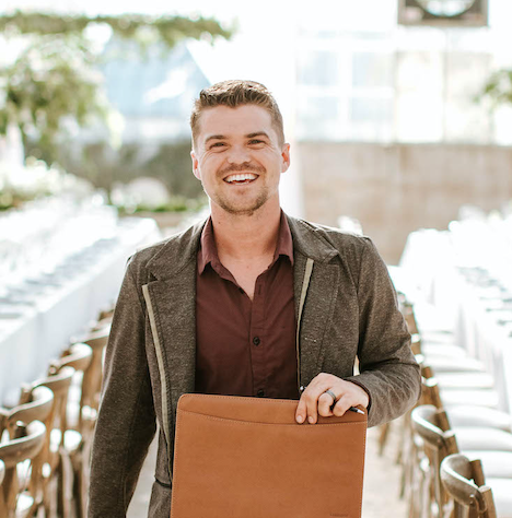 male wedding planner at a wedding