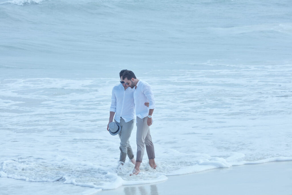 gay couple on the beach