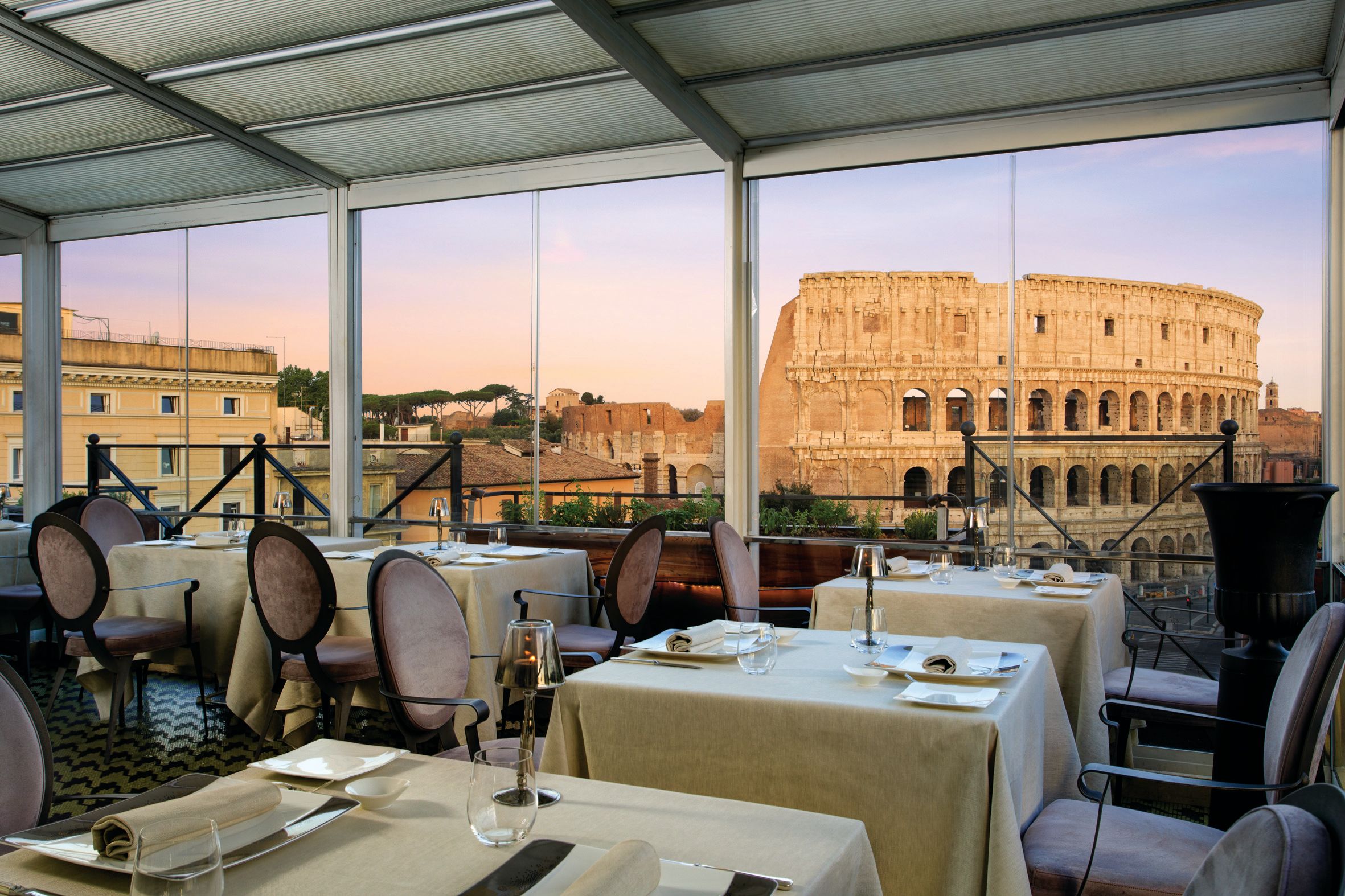 The colosseum through a restaurant window