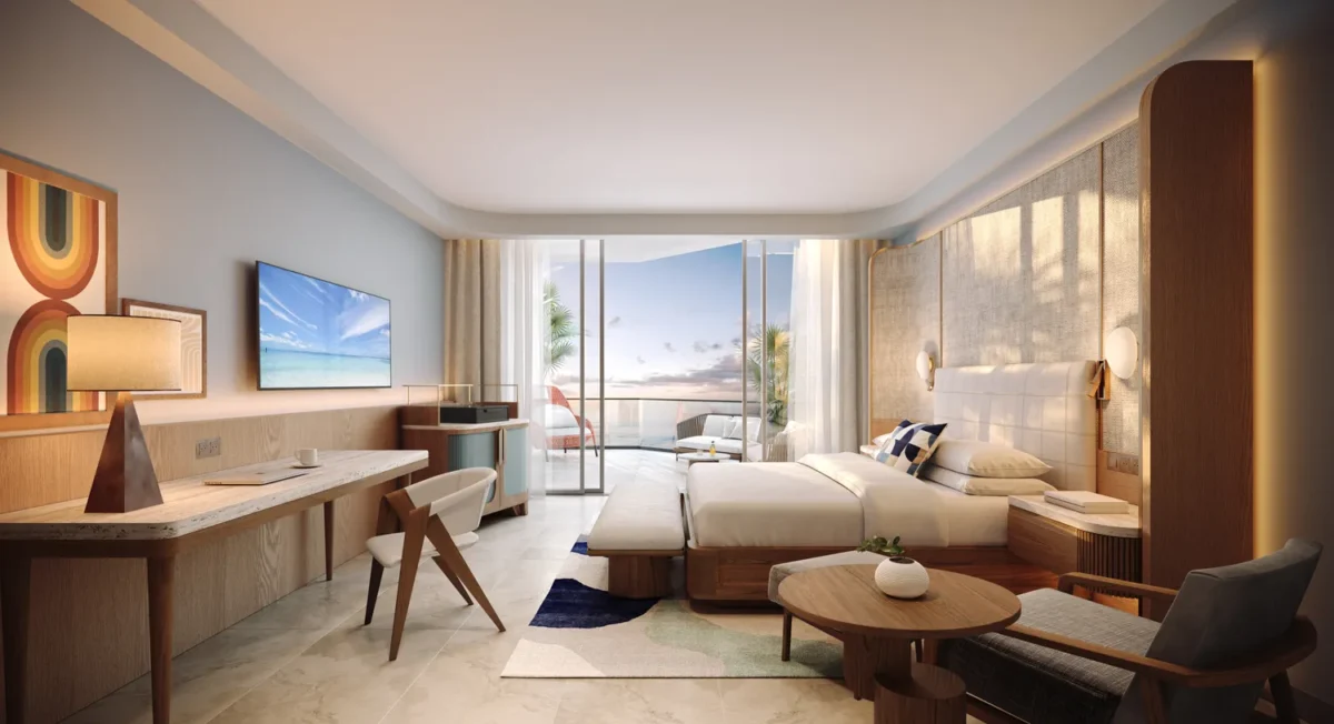 Luxury Hilton Aruba Caribbean Resort bedroom with ocean view, perfect for a Hilton Aruba Destination Wedding.