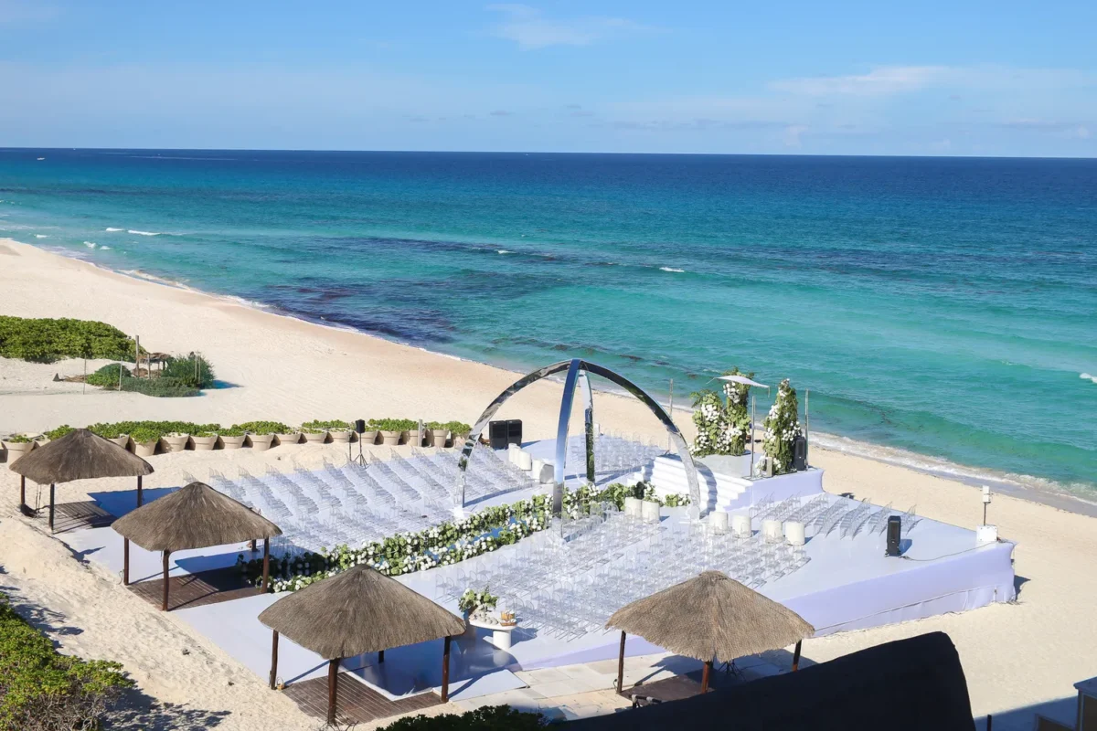 Beachfront destination wedding resort setup at Kempinski Hotel Cancún