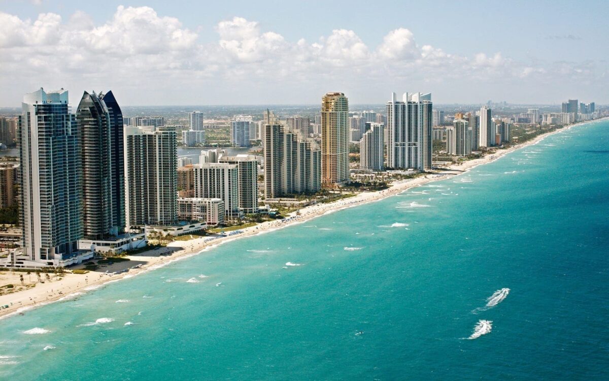 Miami Beach skyline with skyscrapers along the ocean and beaches in Florida