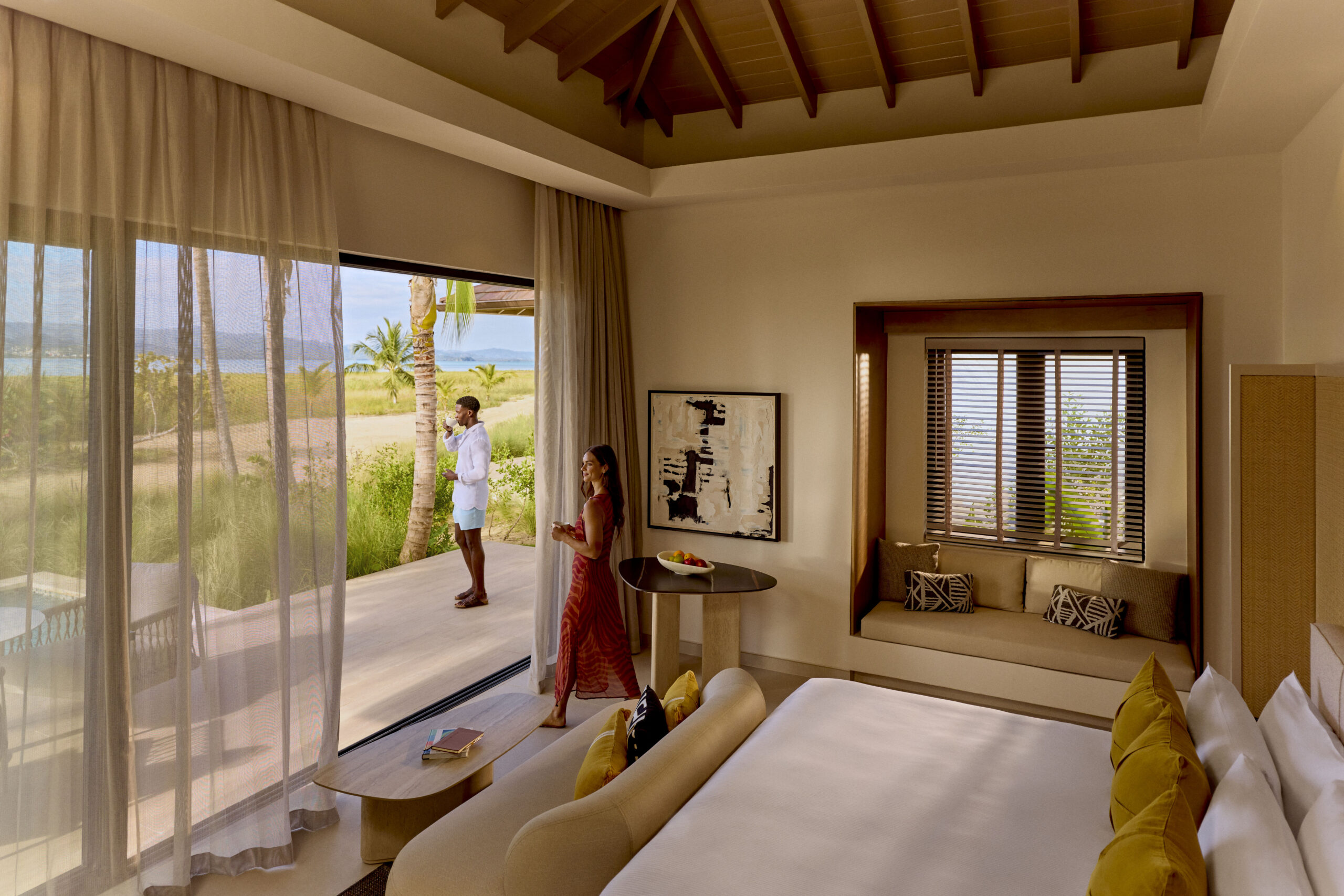 Couple enjoying ocean view from suite at Zemi Miches All-Inclusive Resort