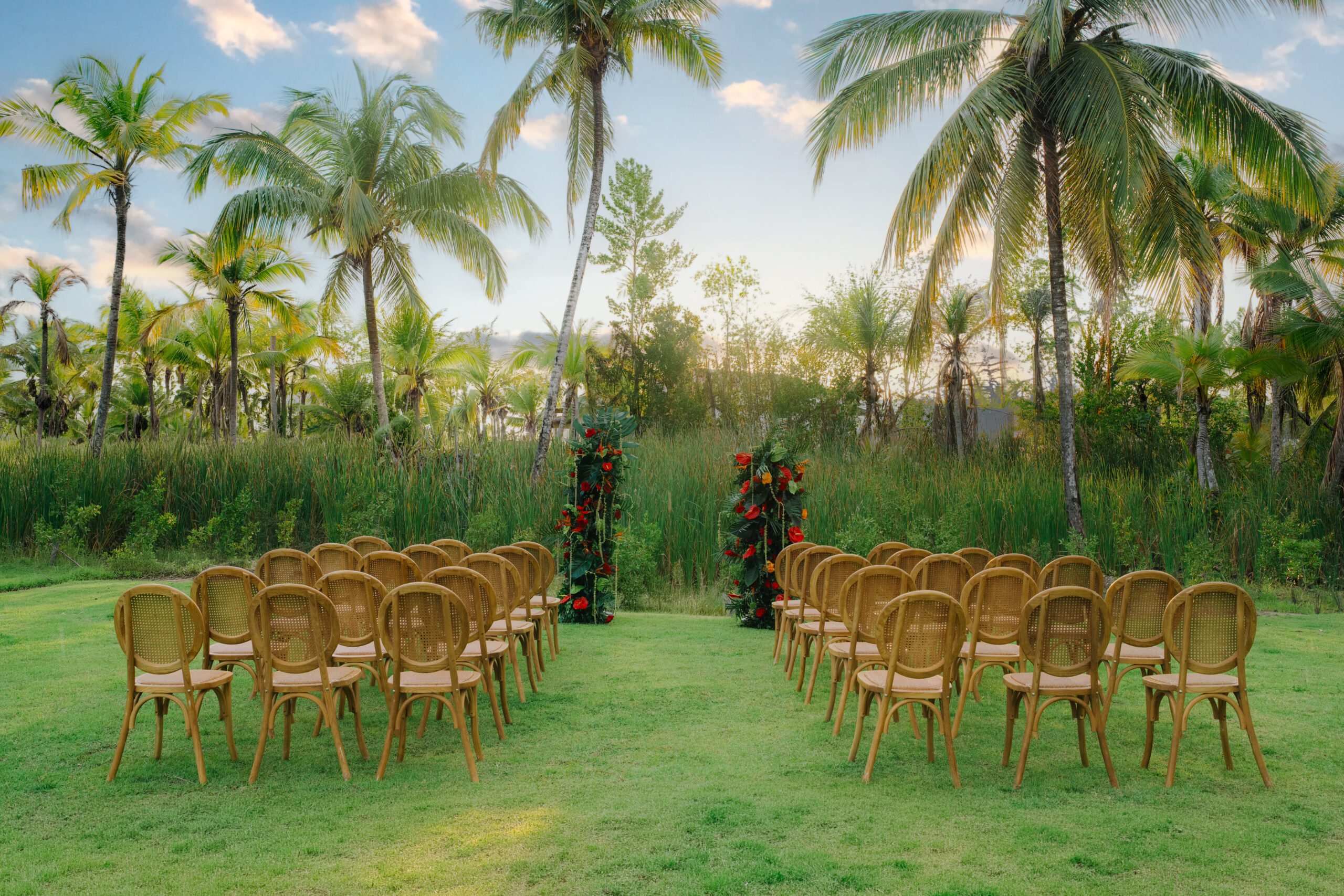 Zemi Miches wedding setup with chairs and palm trees