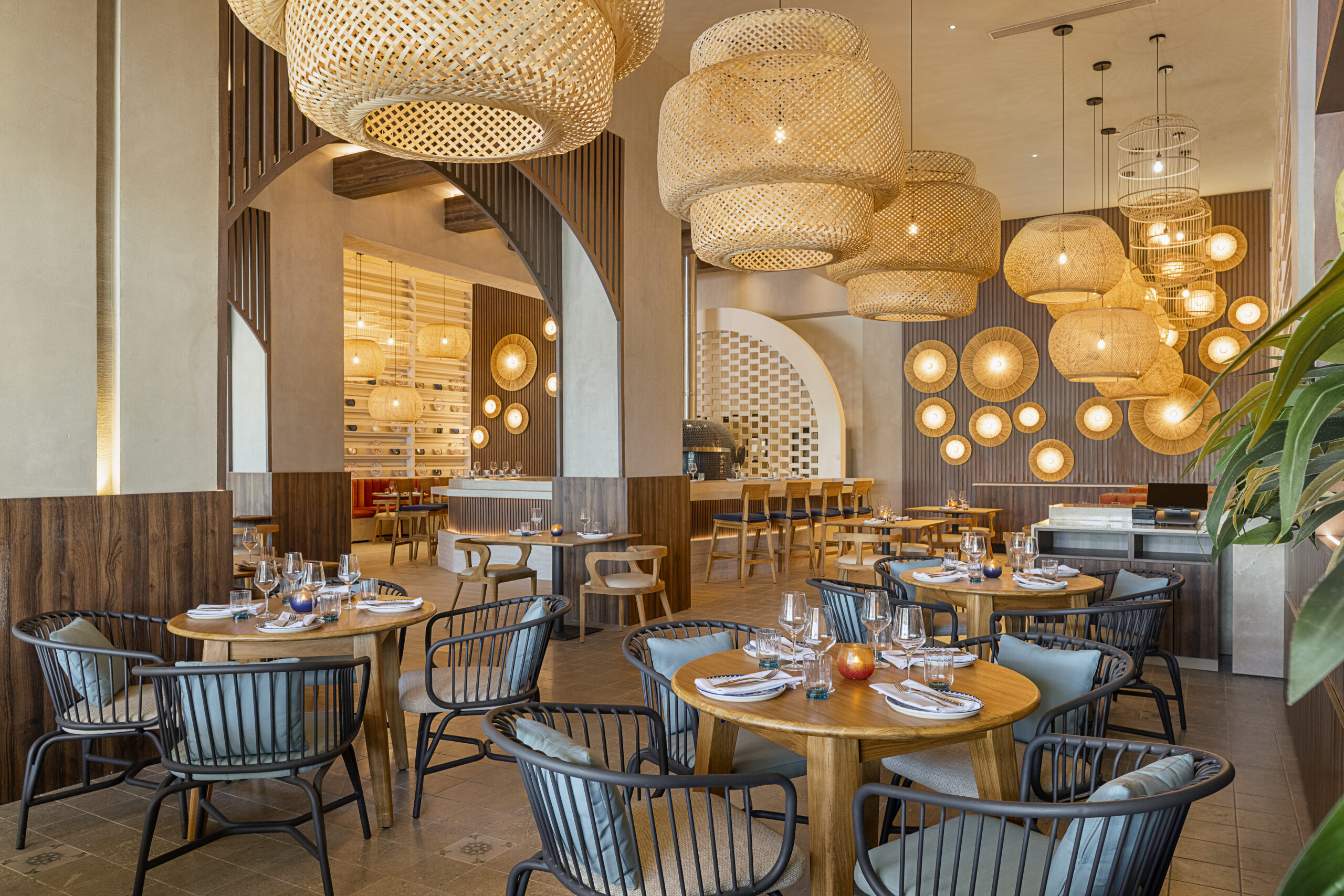 Dining area at Zemi Miches All-Inclusive Resort, Curio Collection by Hilton, with tables and chairs
