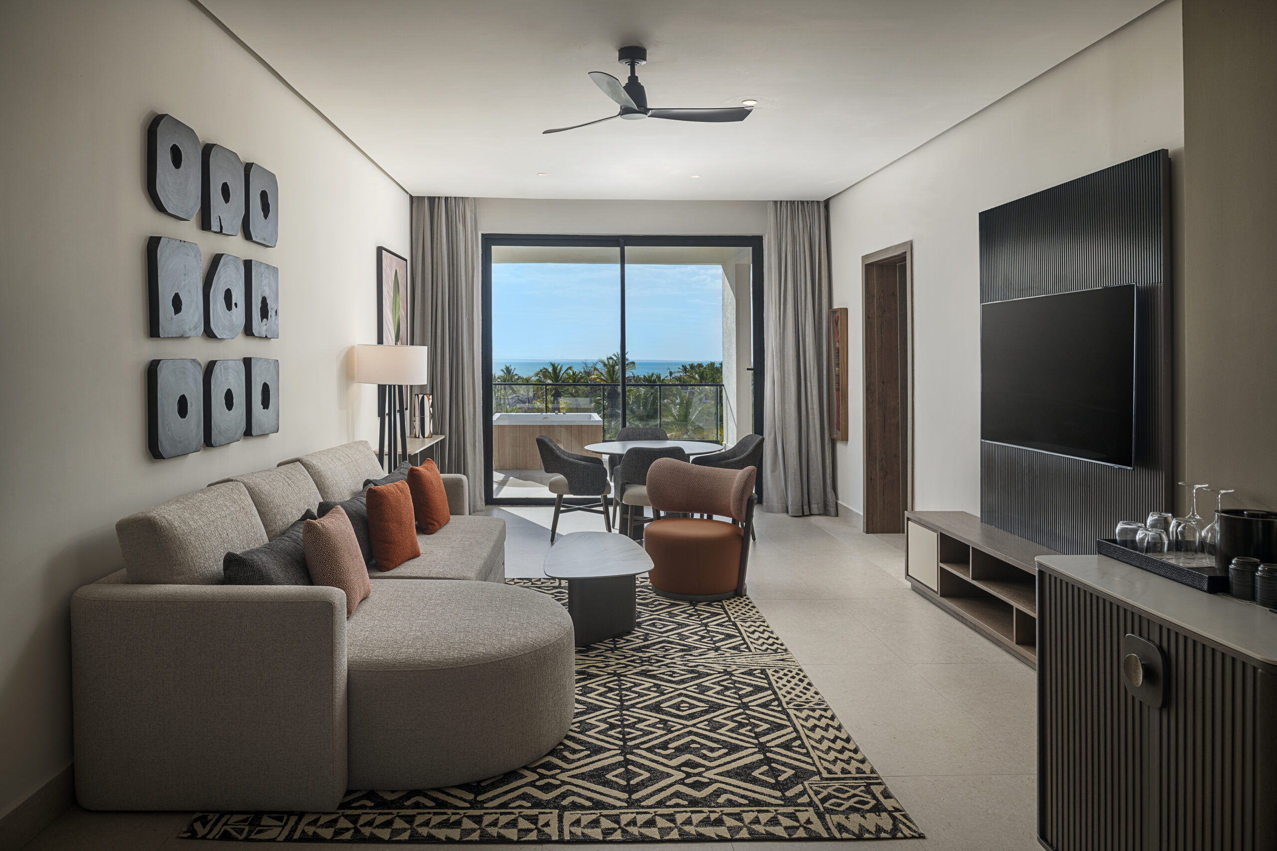 Suite living area at Zemi Miches All-Inclusive Resort with ocean view balcony