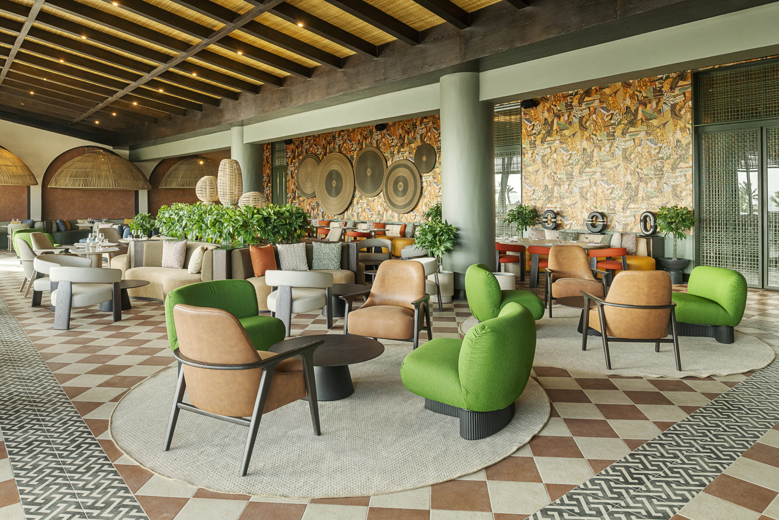 Zemi Miches All-Inclusive Resort lobby with colorful seating and tropical decor.