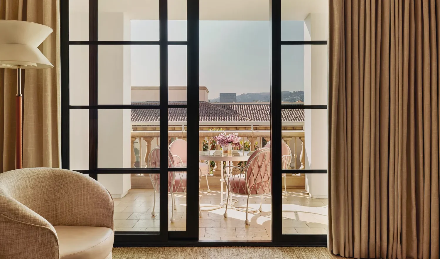 Luxury suite at Maybourne Beverly Hills with private balcony and city views. Ideal for a Beverly Hills wedding venue.