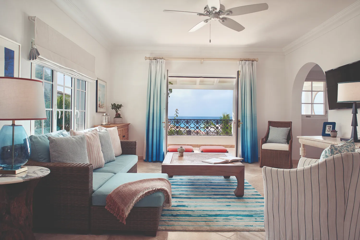 Luxurious Caribbean living room with ocean view; ideal for a destination wedding at La Samanna, a Belmond Hotel.