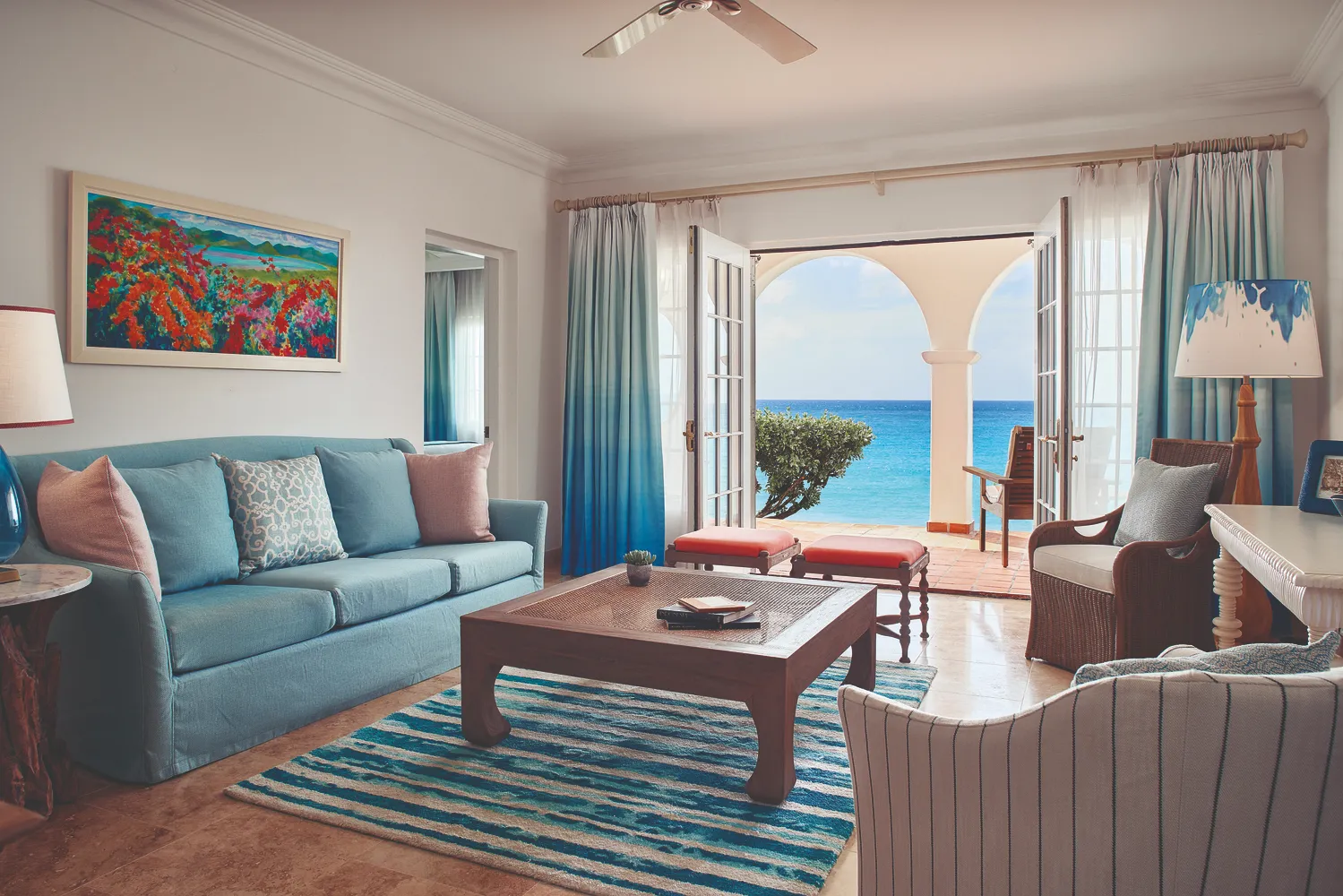 Oceanfront living room at La Samanna, a Belmond Hotel, St. Martin. Luxurious Caribbean destination wedding venue.