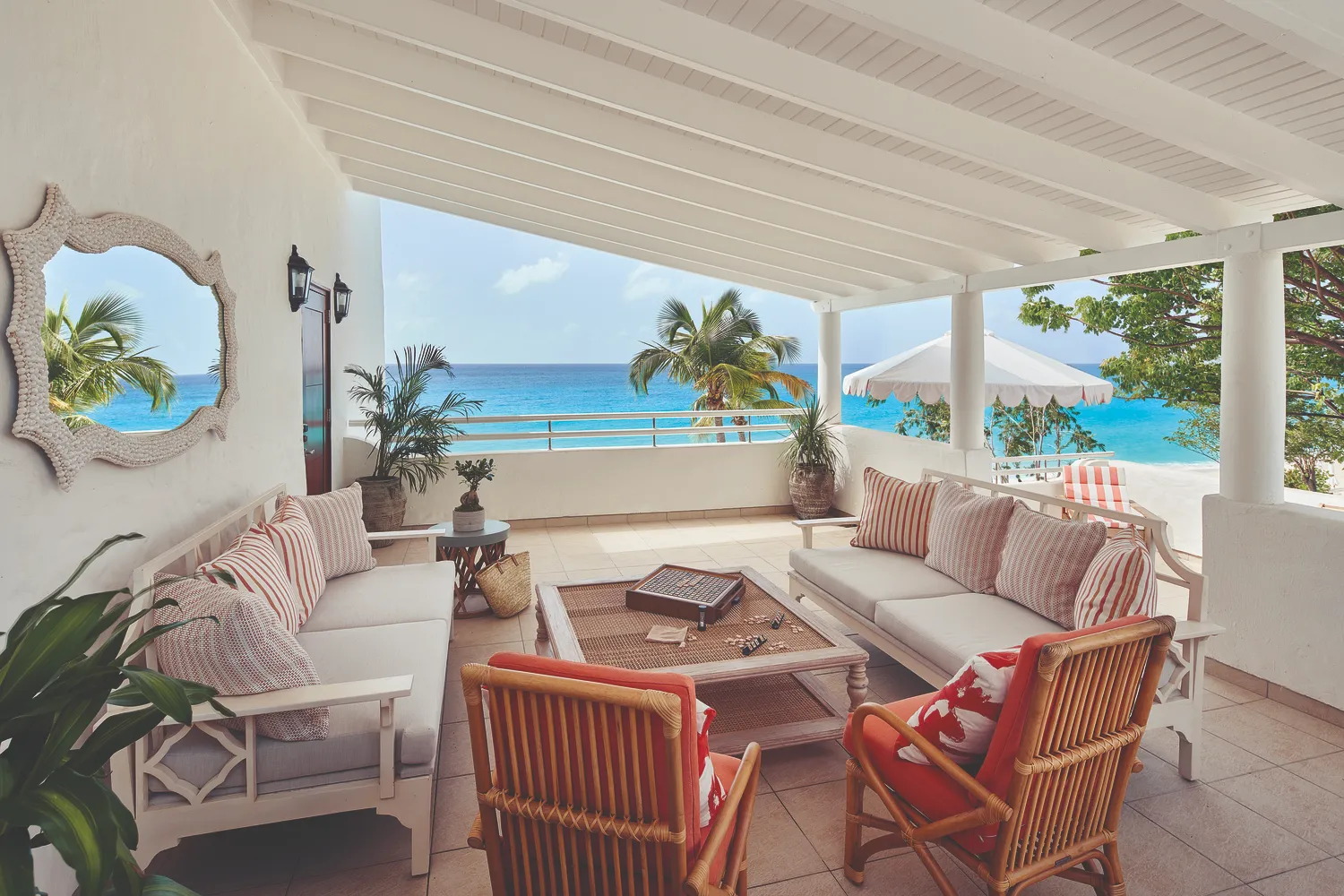 Luxury beachfront patio at La Samanna, a Belmond Hotel, perfect for a Caribbean destination wedding.