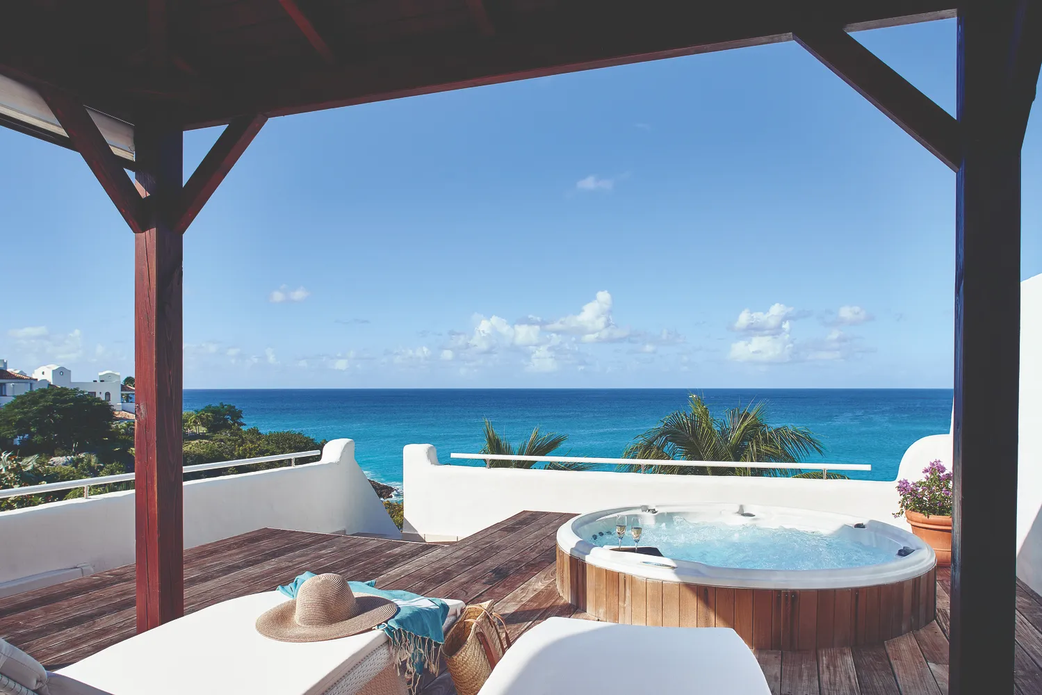 Romantic Caribbean hot tub overlooking ocean at La Samanna, a Belmond Hotel. Perfect destination wedding venue.