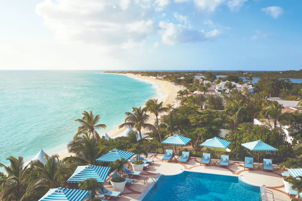Luxurious Caribbean destination wedding venue overlooking the beach with a private villa and infinity pool.