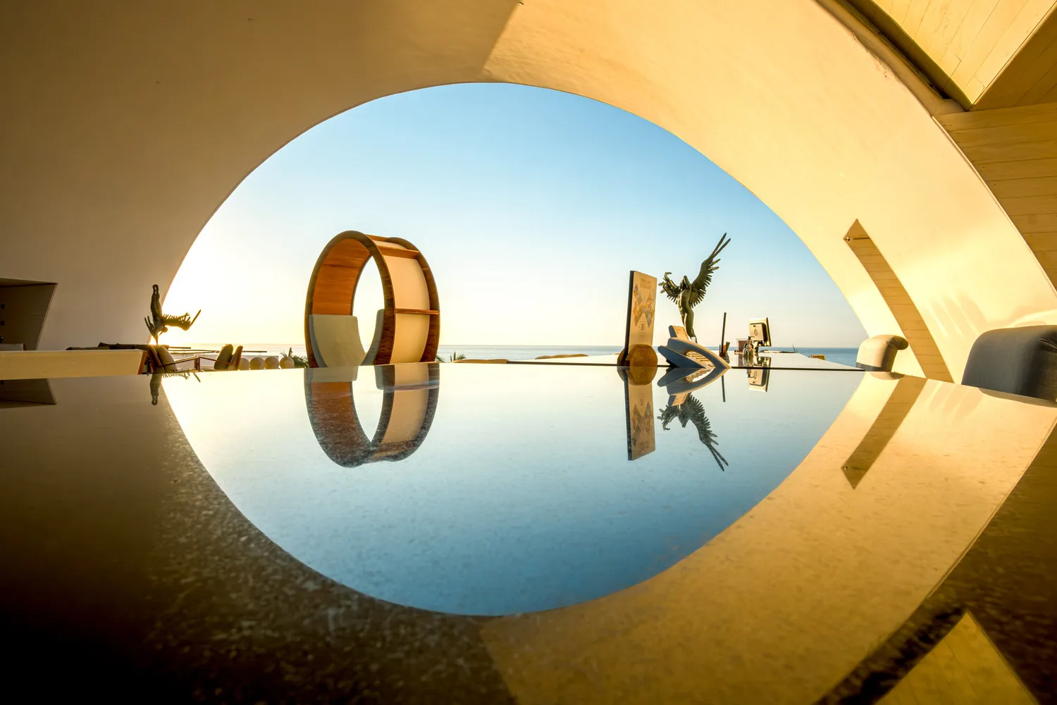 Reflective table overlooking ocean at Marquis Los Cabos, a luxurious Los Cabos wedding destination.