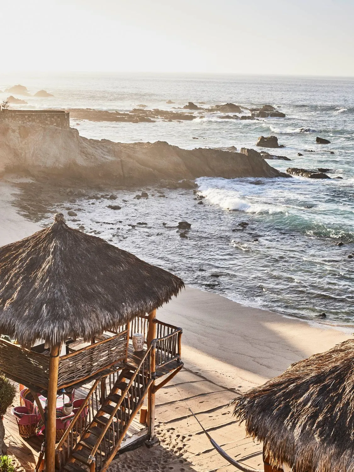 Secluded beach cabanas with ocean views. Perfect for a romantic getaway or a relaxing vacation.