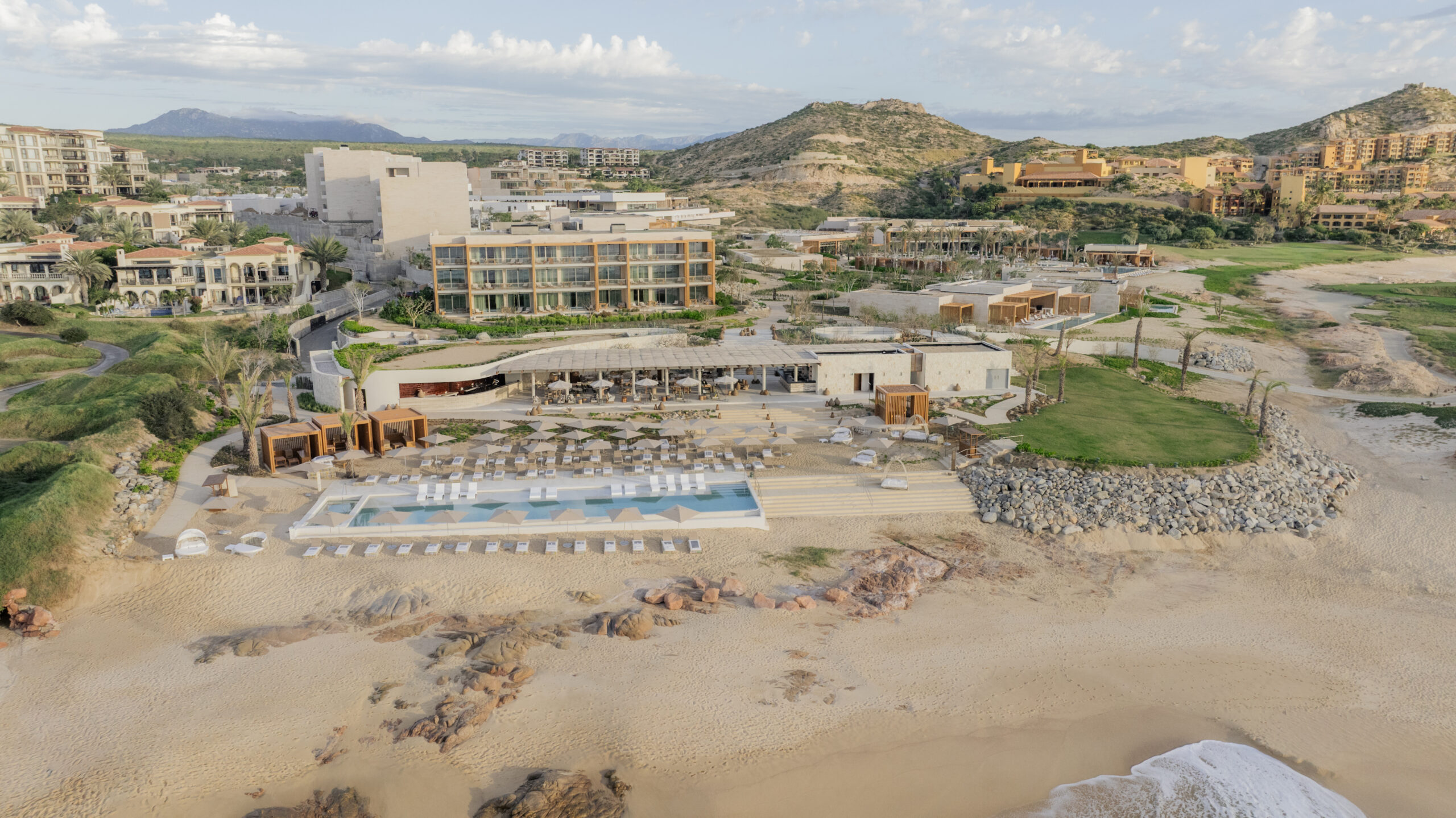 Park Hyatt Cabo del Sol resort aerial view with pool, beach, and buildings. Perfect for a Park Hyatt Los Cabos wedding.